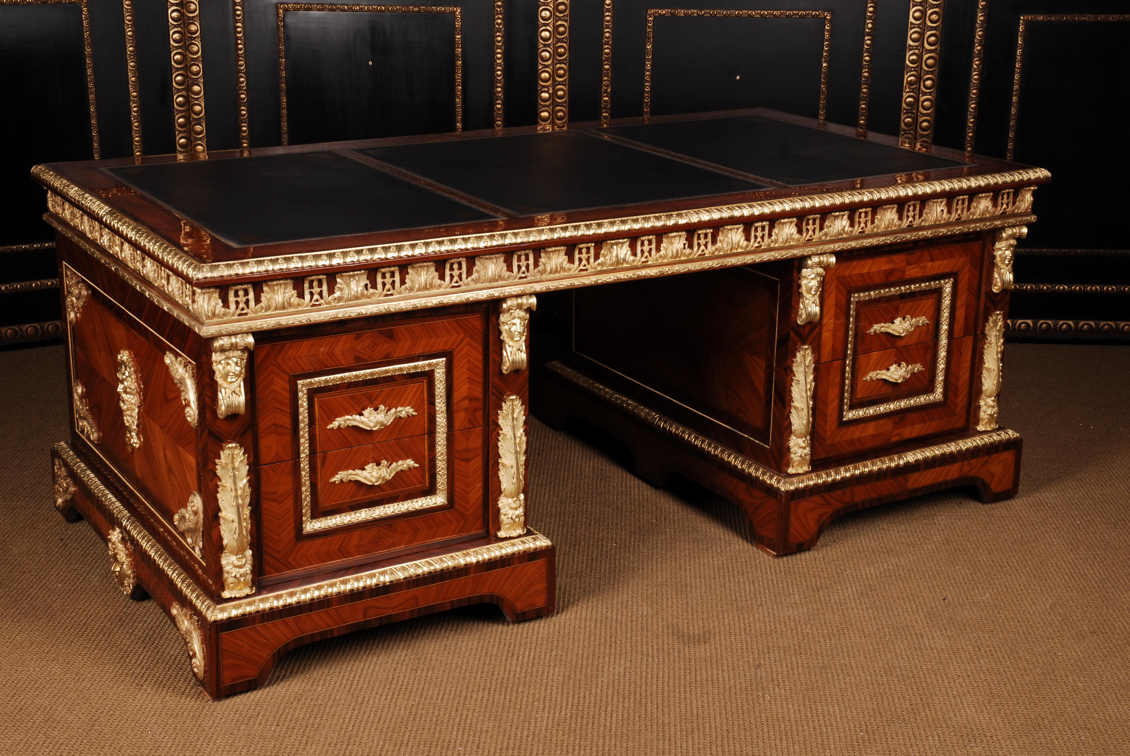 Imposing French Writing Table in Style of Louis 14th
Tulip Wood on Pinewood. Three part, straight border.Narrow overlapping, wide framed writing plate, middle laid, gold embossed Leathe rsurface. Underneath, three drawers of varying sizes with
