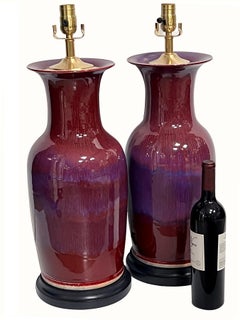 Imposing Pair of Chinese Oxblood Glazed Porcelain Lamps