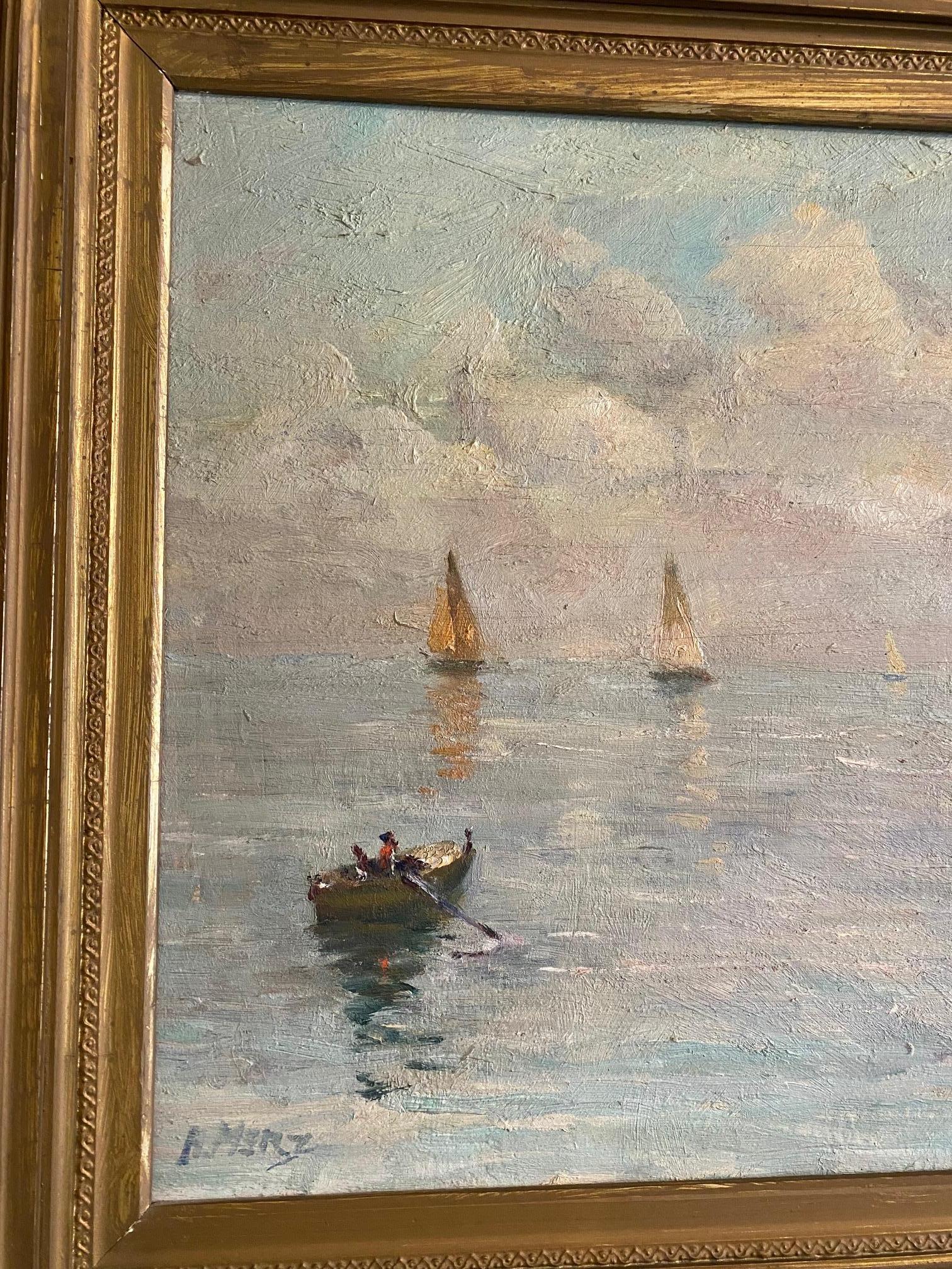 Antique Impressionist Seascape with a Schooner and Sloops on a calm sea, dory in the foreground, under an early morning cloudy sky, signed A. or H. Merz in the lower left, a period oil on canvas in it's original carved and gilded frame. A very