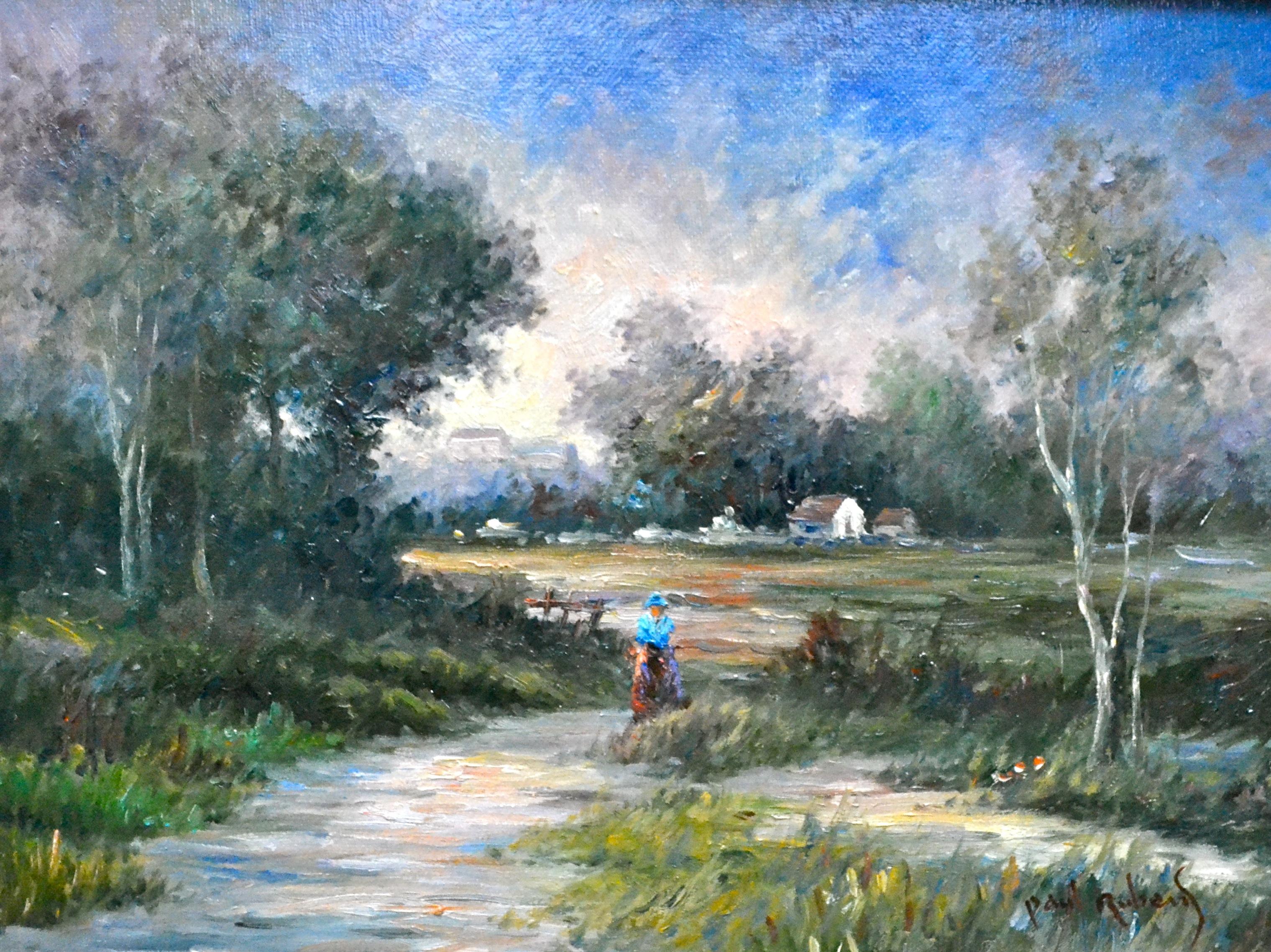 Ein gut gemaltes, farbenfrohes Ölgemälde, das eine Dame zeigt, die in einer baumbestandenen Landschaft auf eine Stadt in der Ferne zugeht, präsentiert in einem Gold-/Gesso-Rahmen; signiert Paul Rubens; wahrscheinlich Englisch, 20.

