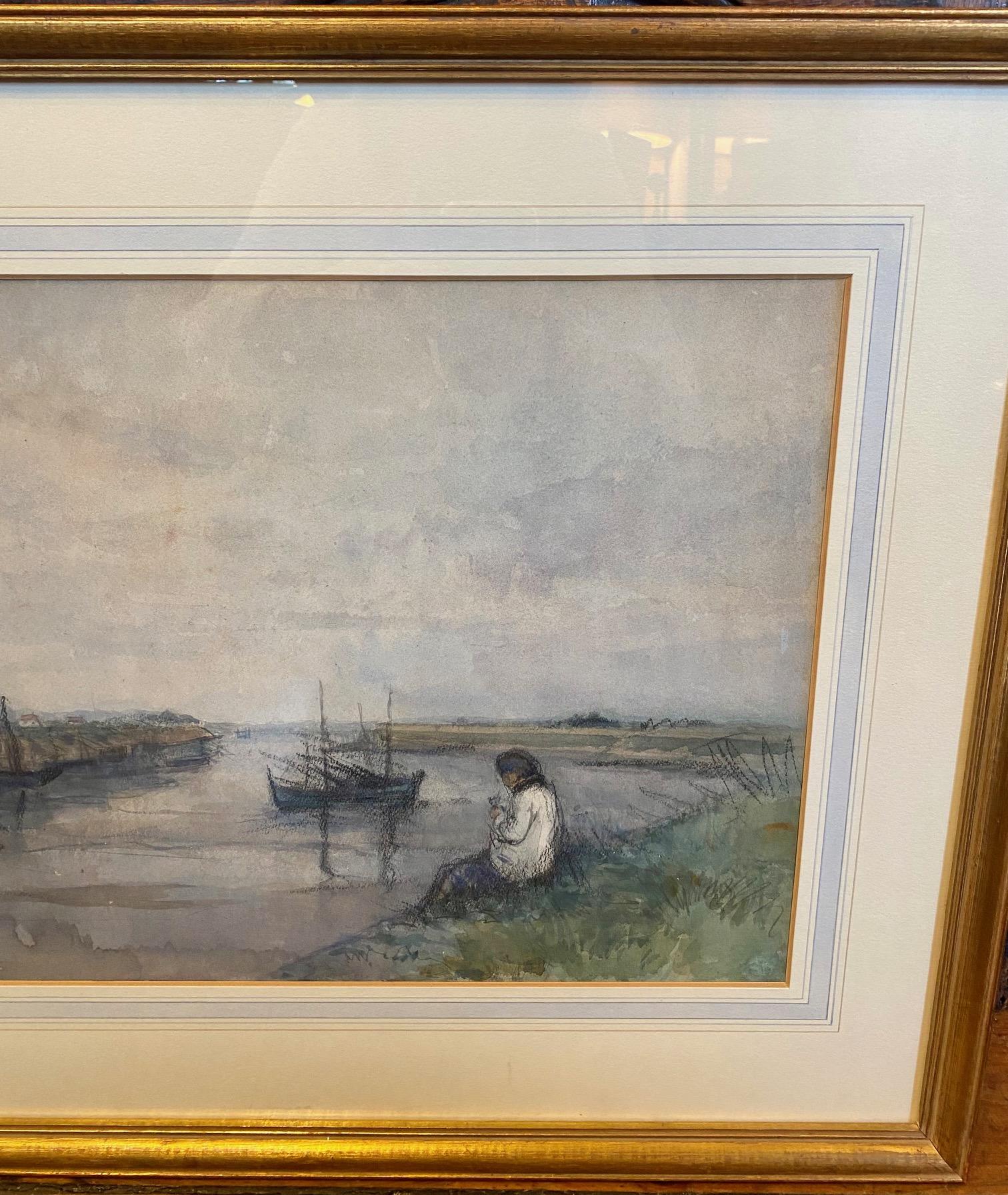 Impressionist Watercolor Shore Scene by Ferdinand Leys (Belgian: 1873 -1960), circa 1920, a hand painted original watercolor on paper impressionist view of a figure seated on the salt marsh bank of an inlet, with fishing boats moored along pier on