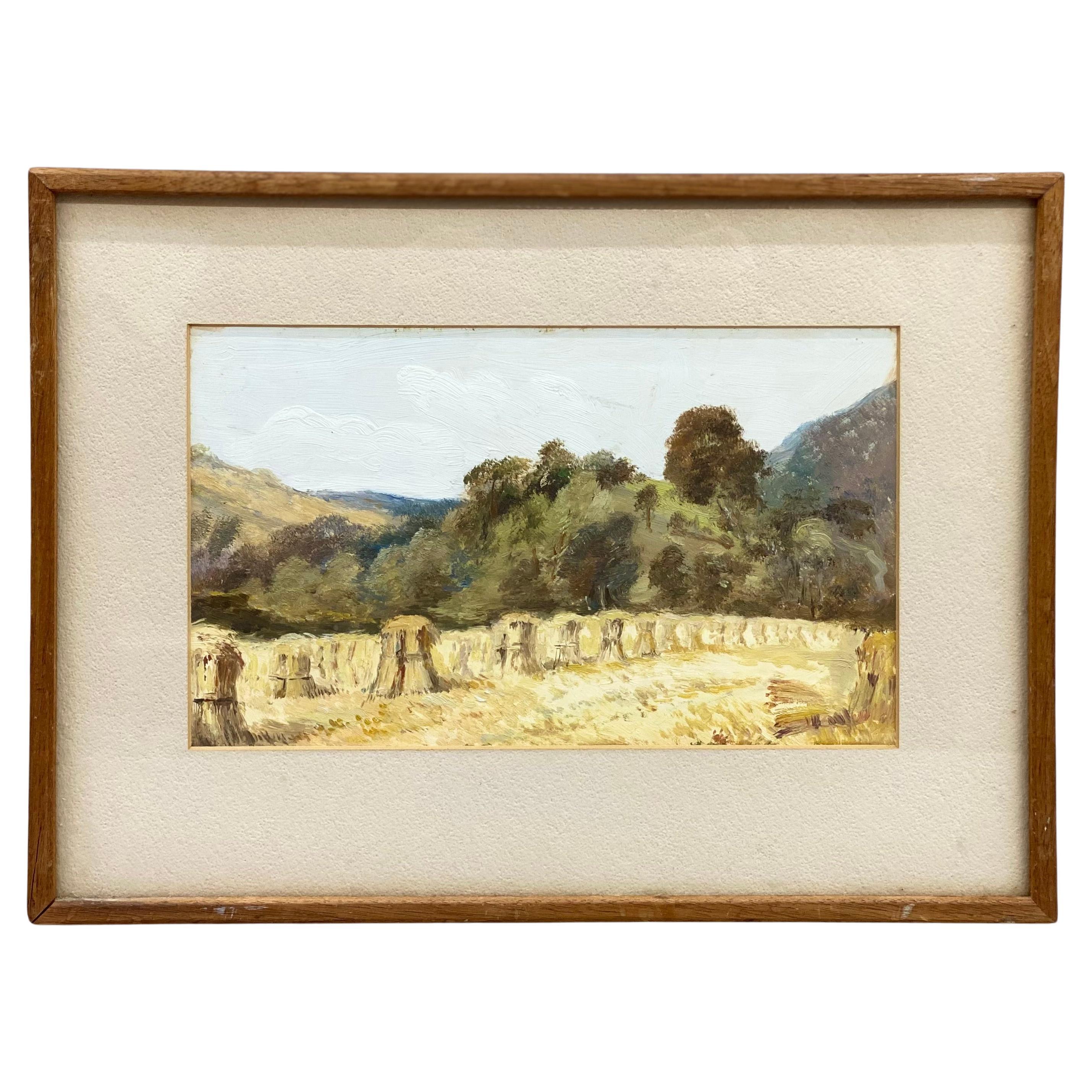 Peinture impressionniste d
un paysage espagnol baigné de soleil avec des gerbes de foin en vente