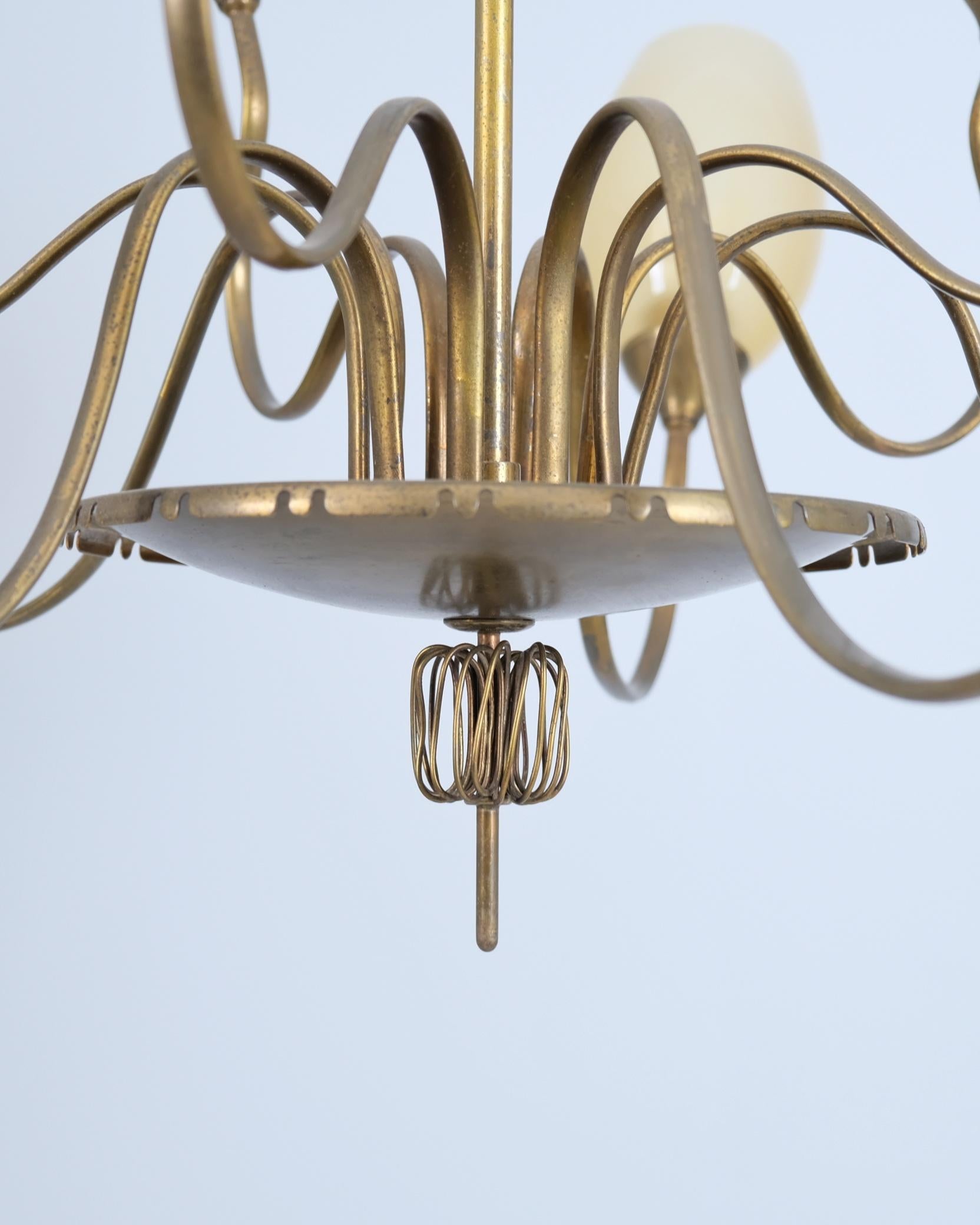 Impressionante lampadario a 10 bracci in ottone Paavo Tynell modello 9017, Taito 1950s in vendita 1