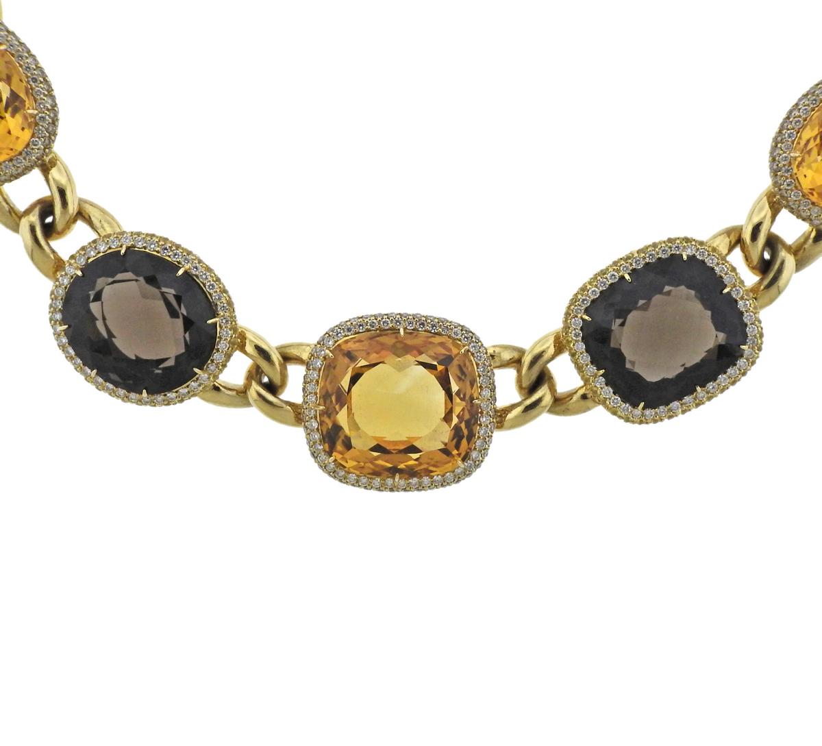Gorgeous circa 1980s 18k gold cocktail necklace, set with multi shape topaz gems, surrounded with a total of approximately 9.50-10ctw in GH/VS diamonds. Necklace is 16