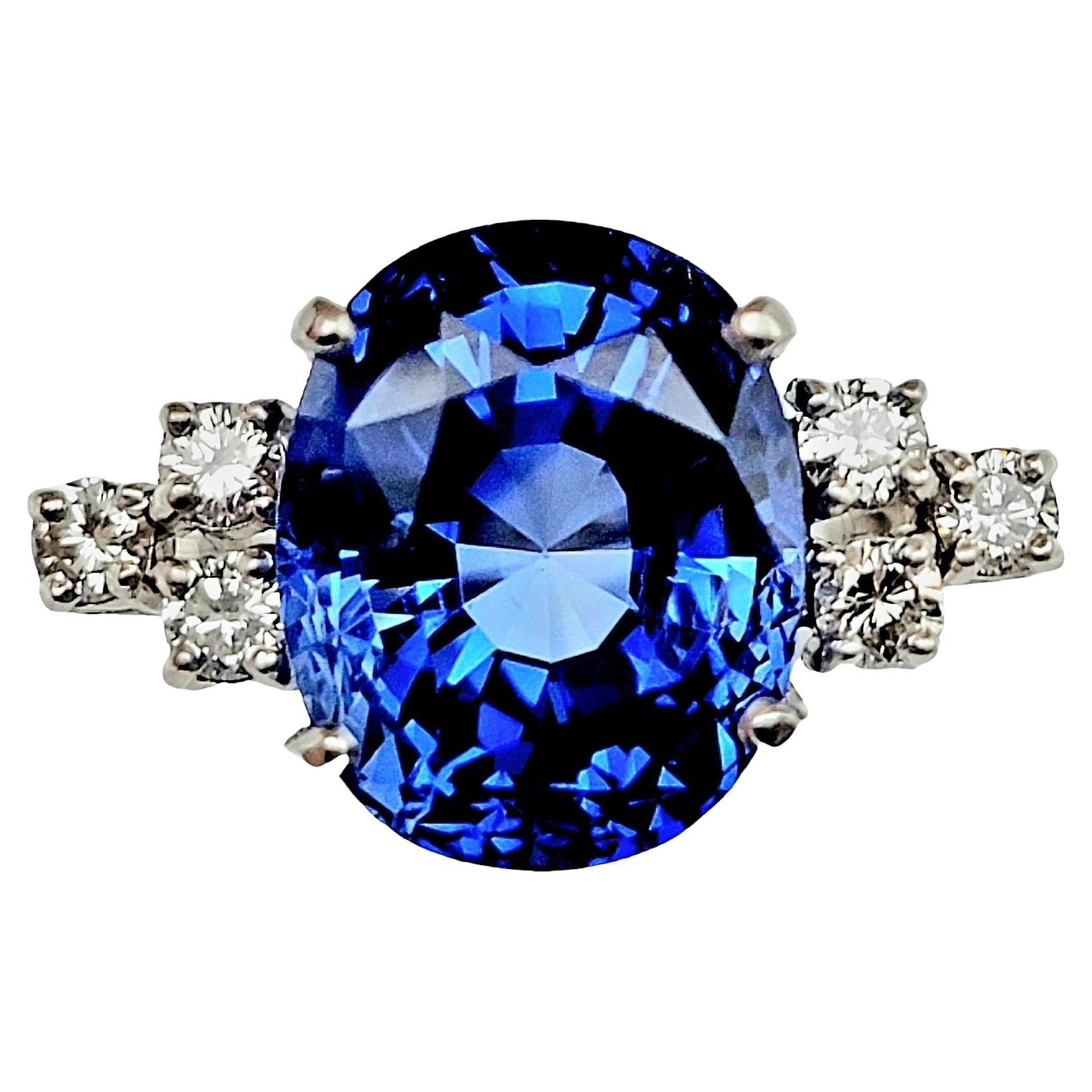 Impressive 15.35 Carat Rare Untreated Oval Ceylon Sapphire and Diamond Ring For Sale