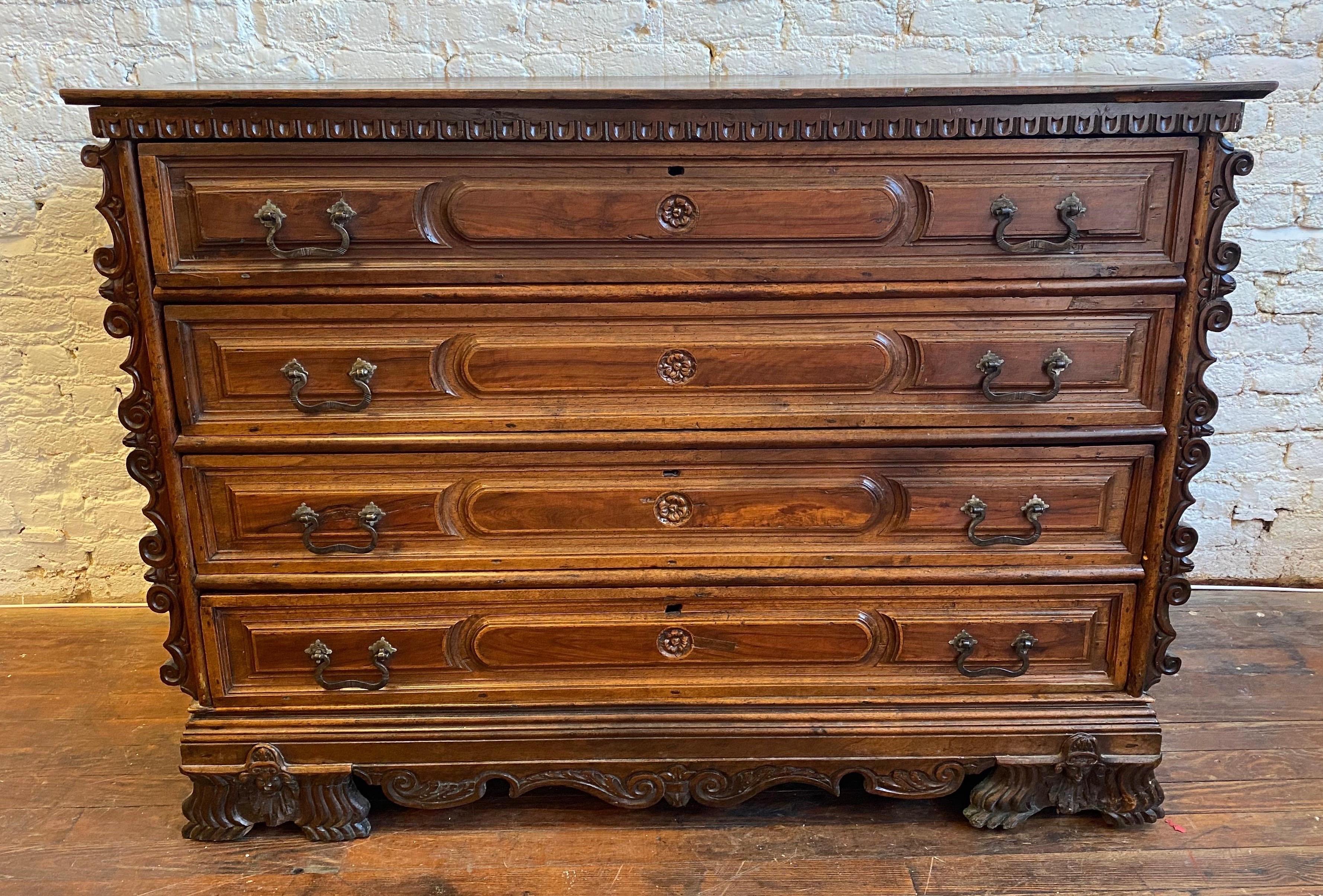 Impressive early Italian walnut 4-drawer commode from the 17th-early 18th century. Standing almost 42