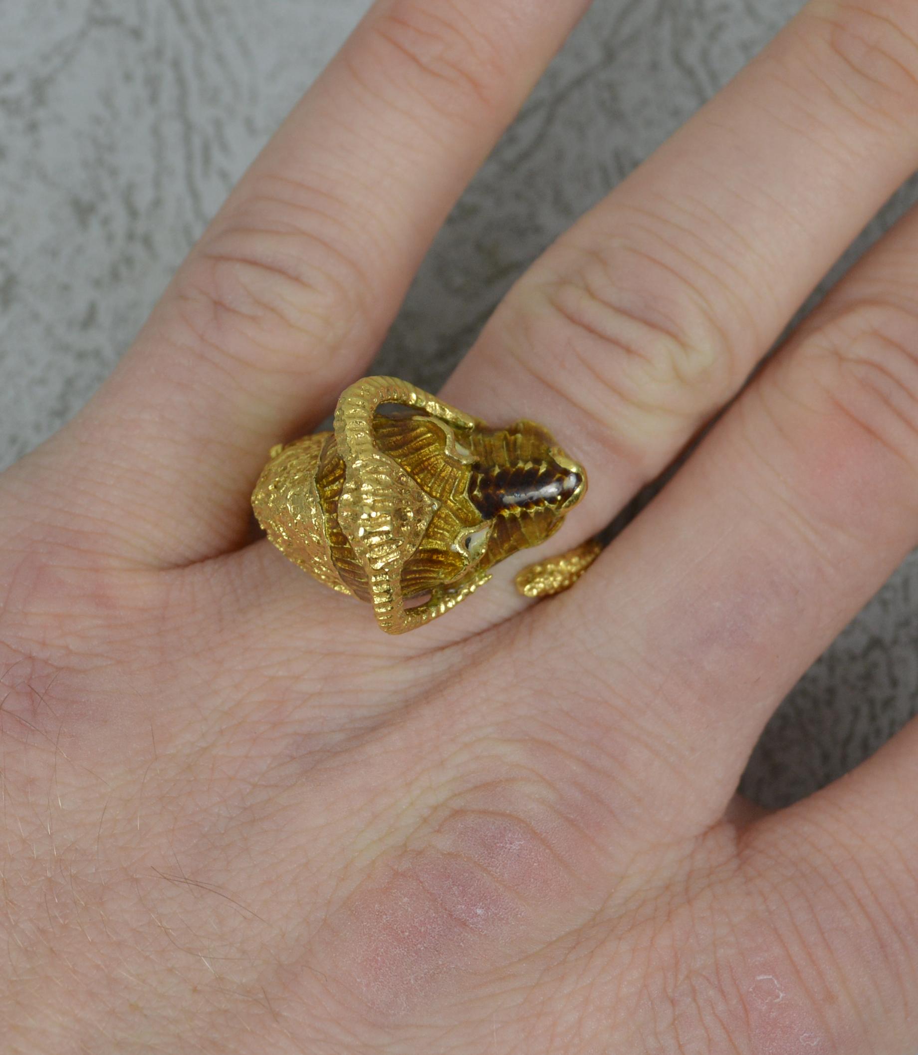 A superb statement ring in the form of a ram.
Solid and heavy 18 carat yellow gold example.
The head realistically modelled as a ram head with enamel and pattern to band throughout.

CONDITION ; Very good. Crisp design. Clean enamel. Issue free.