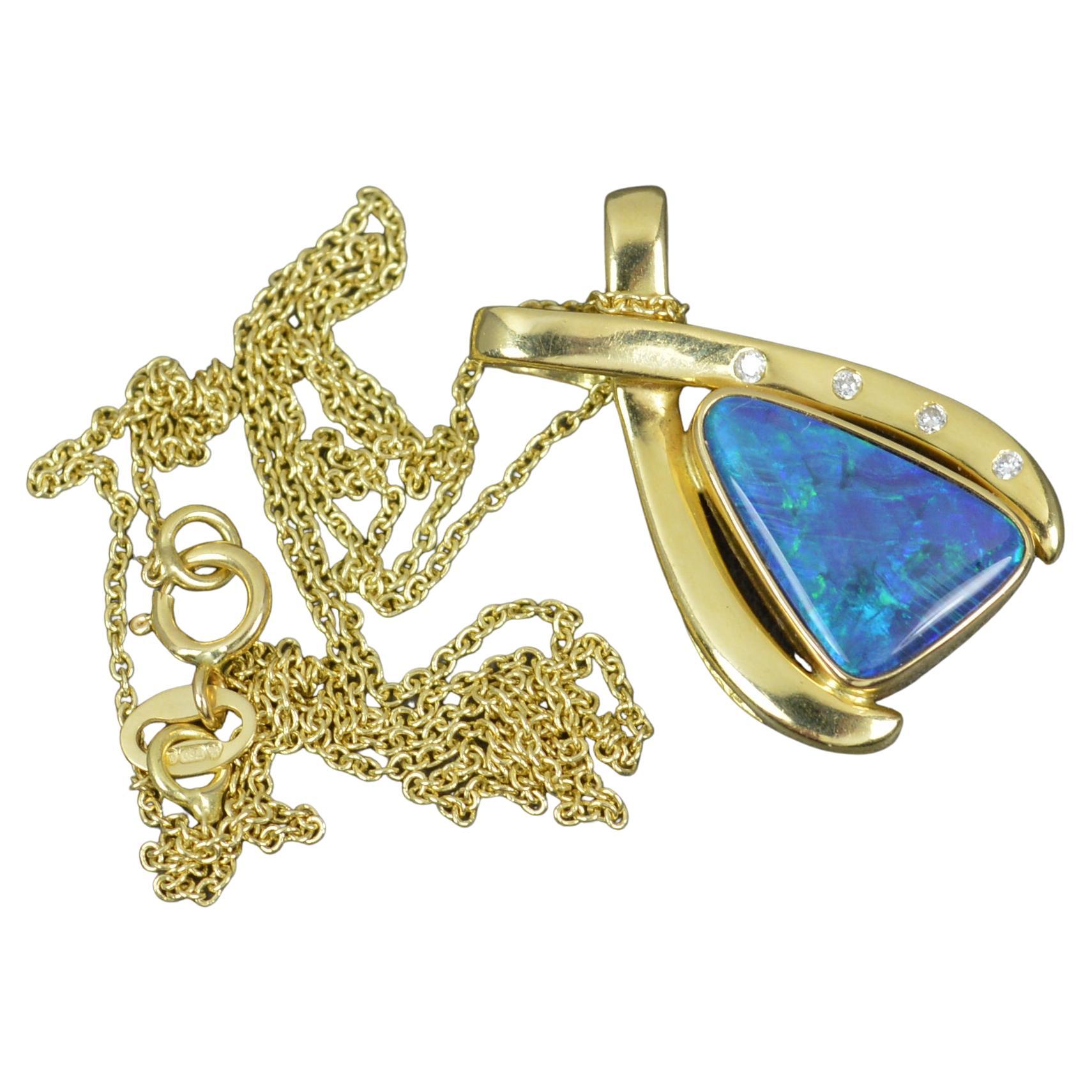Impressive 18 Carat Gold Opal and Diamond Pendant and Chain For Sale