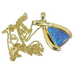Impressive 18 Carat Gold Opal and Diamond Pendant and Chain