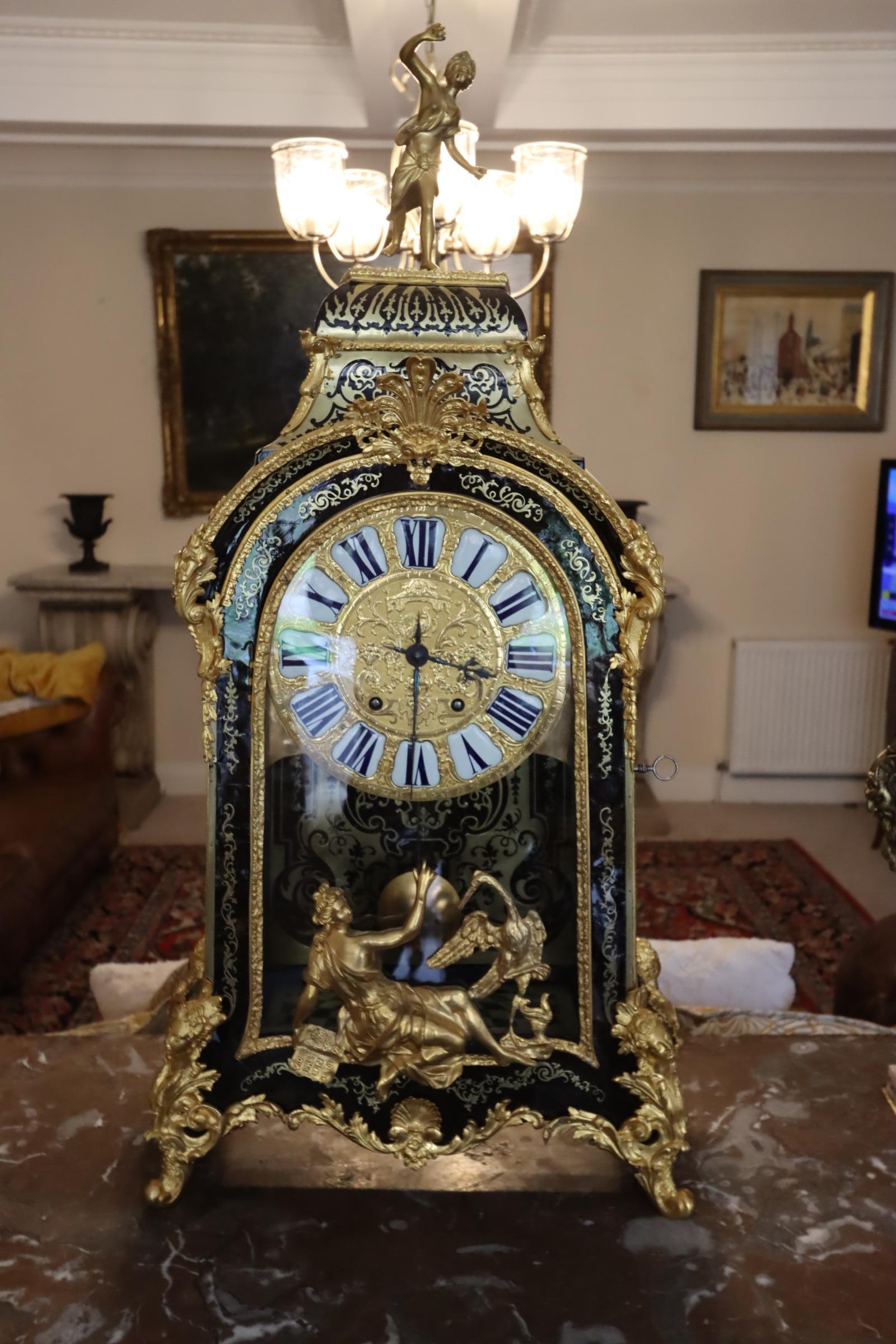 18th century, guilt bronze mounted table clock, with tortoise shell. This truly is an exceptional clock.