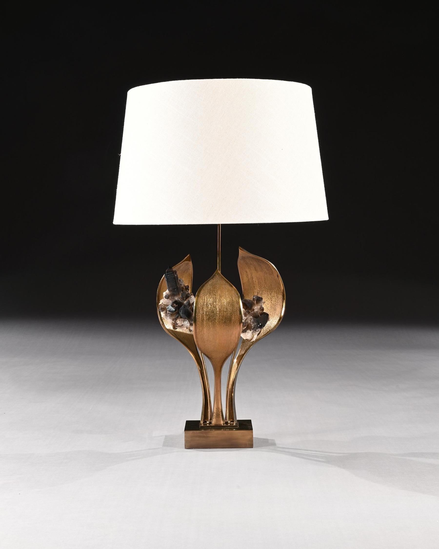 Impressive mid 20th century gilt bronze, brass and quartz table lamp by Willy Daro.



Belgium Circa 1970 



Superb quality and luxurious mid century modern table lamp of large proportions, having an adjustable shade height, with shaped