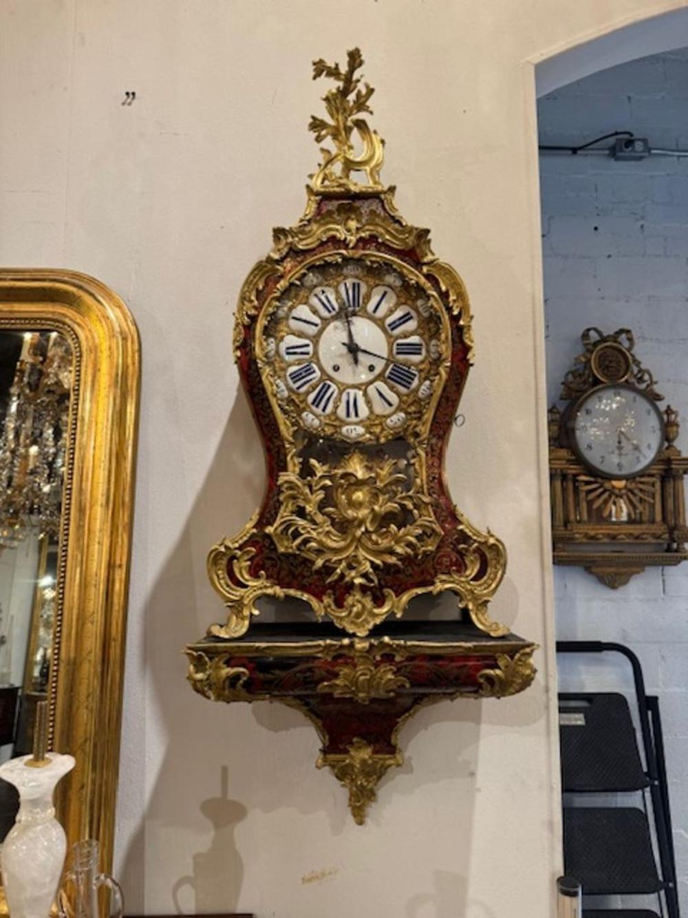 Experience the elegance of the 19th century with this stunning French Boullework and Gilt Bronze Bracket Clock. The intricate craftsmanship is evident in the exquisite details of the boullework, complemented perfectly by the rich gilt bronze