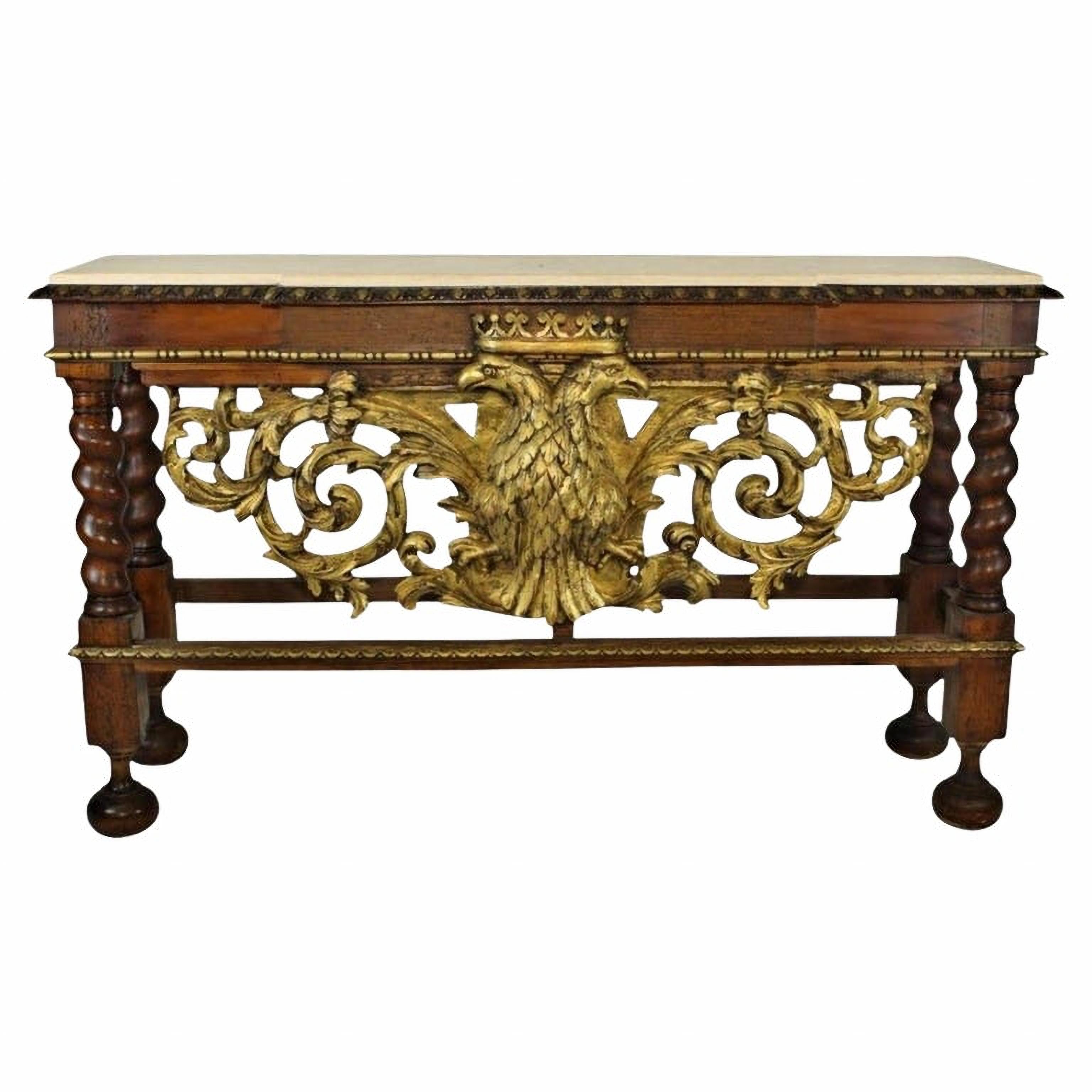 Impressive 19th century Italian walnut wall table

Richly carved and gilded enriched by Raff carving crowned eagles, yellow Sicilian marble top 19th century
Measures: 100cm x 166cm x 46cm
Good condition for the time.