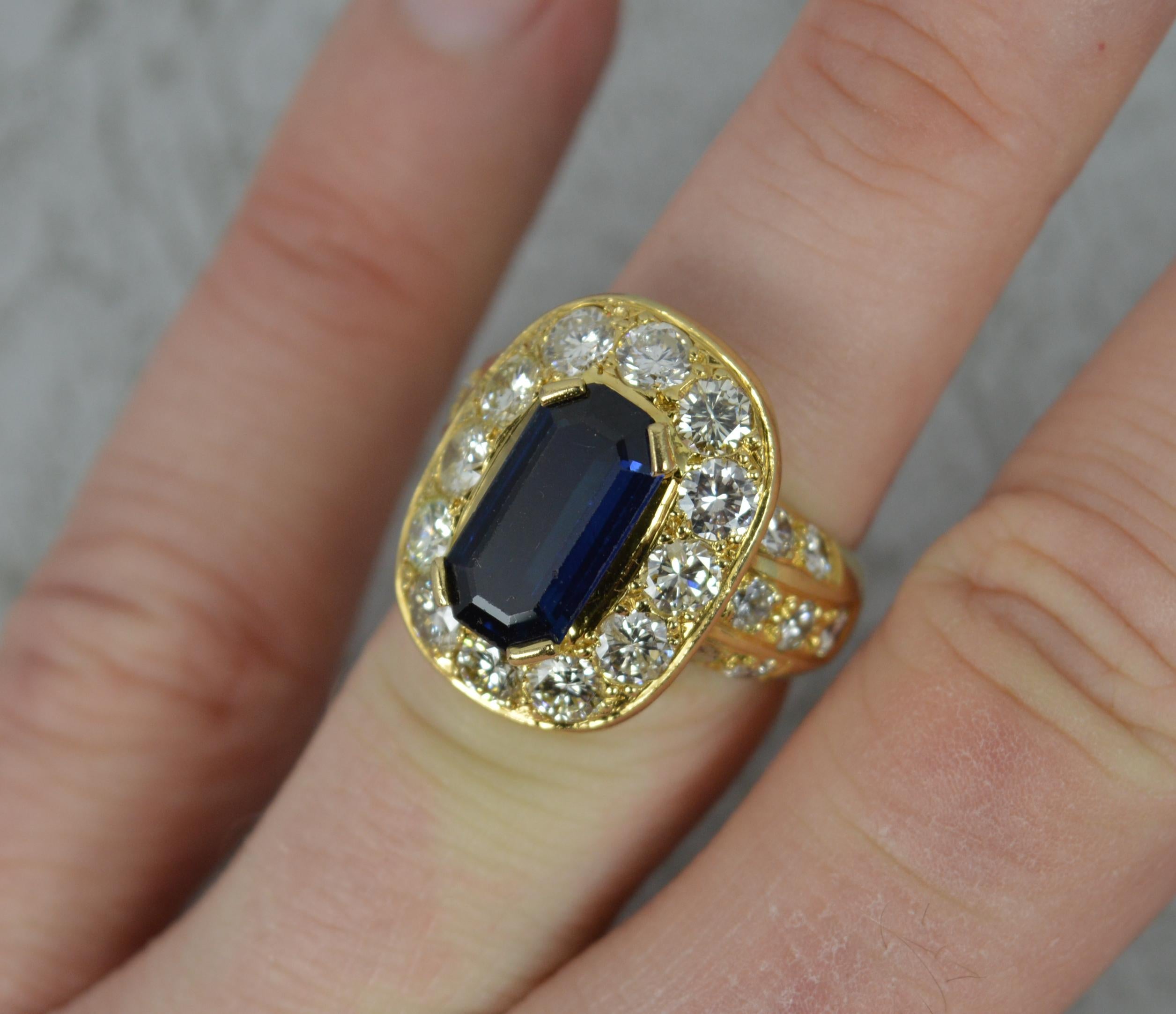 Emerald Cut Impressive 3.00 Carat Diamond 3.75 Carat Sapphire 18 Carat Gold Cluster Ring
