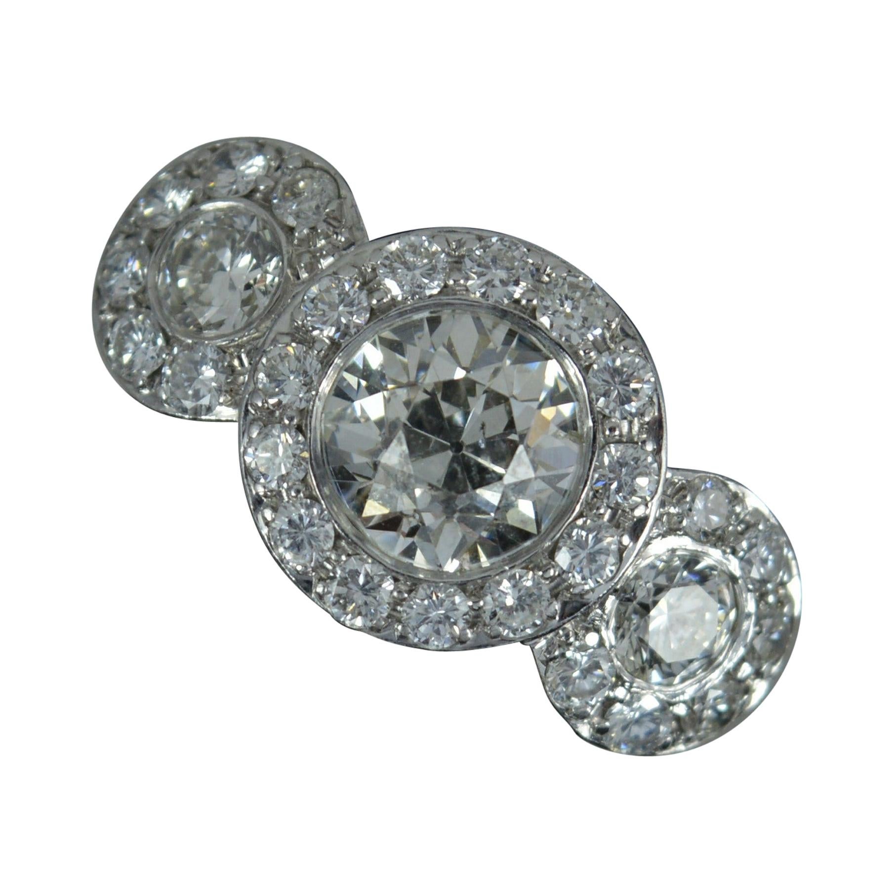 Impressive 3.00ct Old Cut Diamond and Platinum Trilogy Bombe Cluster Ring For Sale
