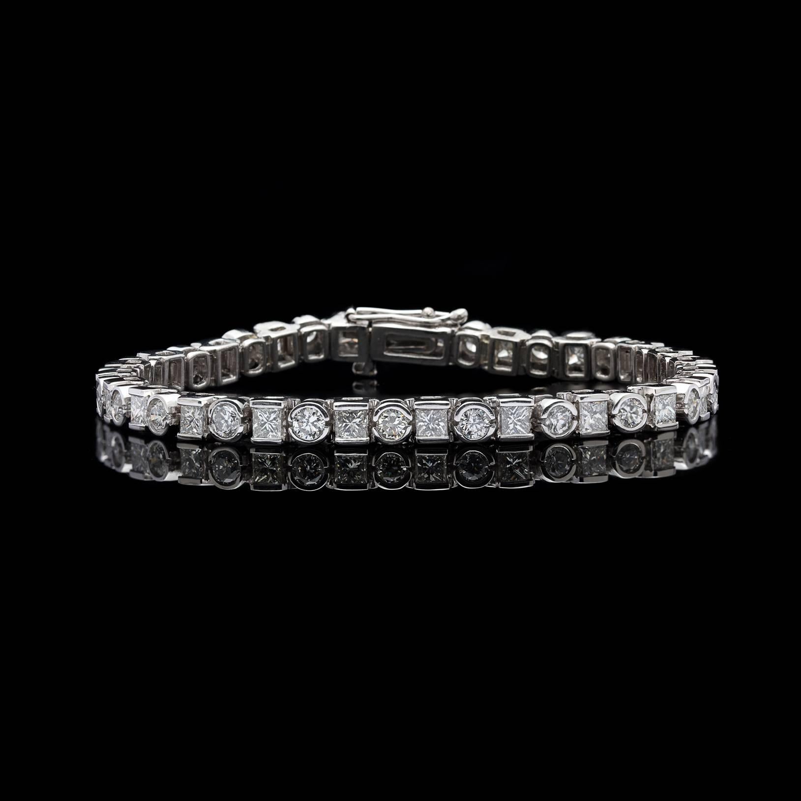 The perfect mix of round and princess cut diamonds come together to form one stunning piece in this gorgeous platinum line bracelet. At 9.20 carats total diamond weight, there is no lack of sparkle in this elegant piece. The 46 alternating shaped