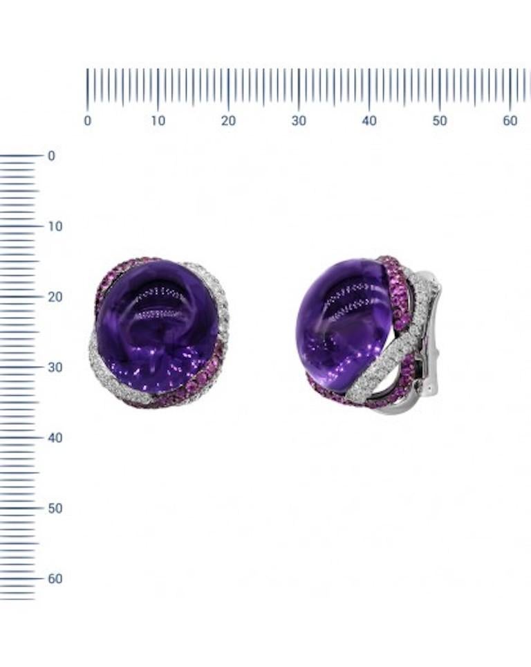 Earrings 18K
Diamond 136-Round 57-1,96-4/5A 
Amethyst 2-Oval-47,25 1/1A 
Pink Sapphire 140-Round-2,43 2/2A
Weight 26 gram

NATKINA embraces the principles of modern Feminism — meaning, we believe a woman’s virtue is more than her external beauty. We