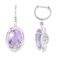 Impressionnantes boucles d'oreilles en or blanc avec améthyste et diamants