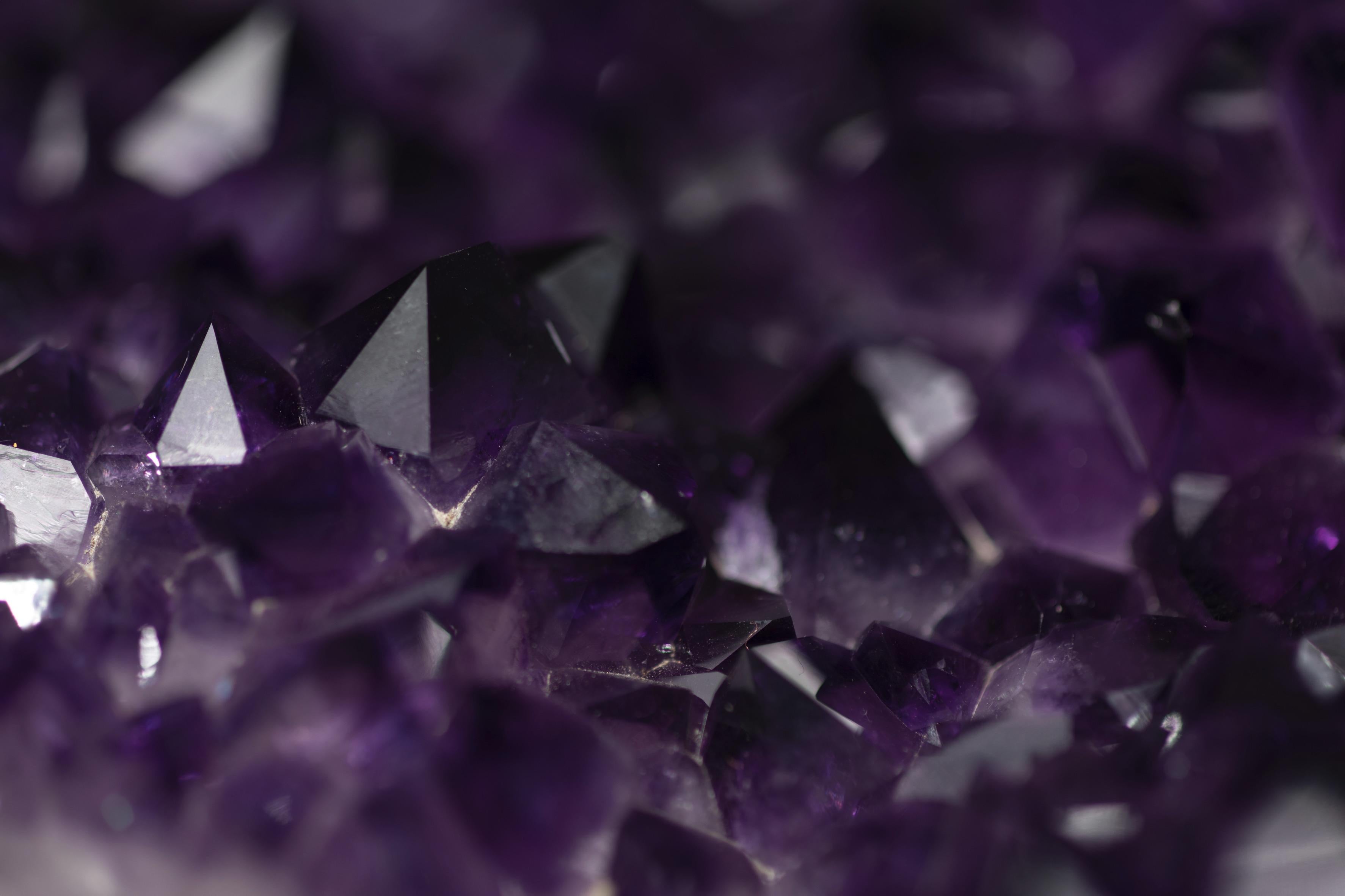 Given its breath-taking stature, one can see that this amethyst cluster was freed from an especially large geode and with amethyst of exceptional quality within. 

The color and size of the crystals' peaks causes the light to be refracted