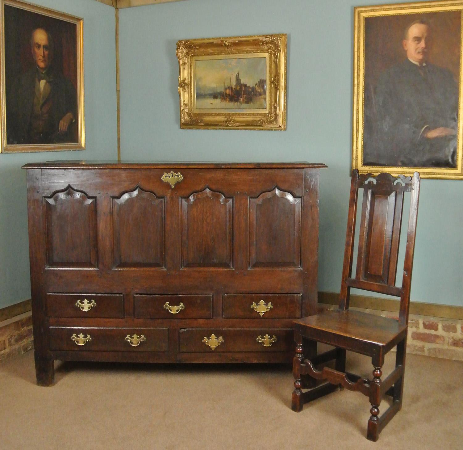 A particularly good example in excellent original condition and of large and impressive proportions.

The chest retains its original lock and original brass escutcheons and finely shaped brass handles – all very sound with wonderful patina and the