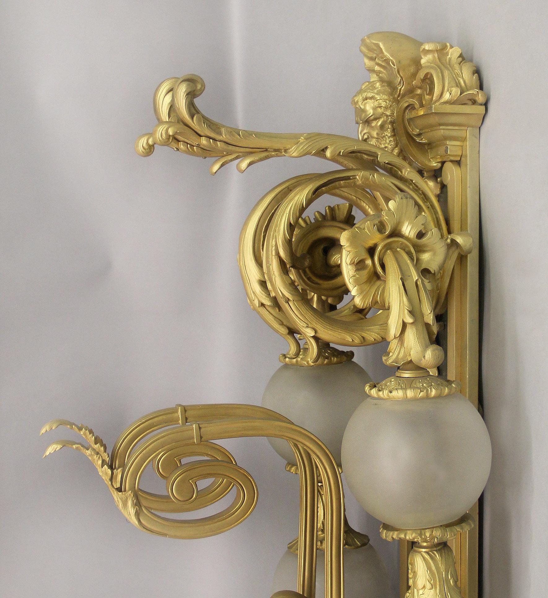 Impressive and Imposing Pair of Early 20th Century Gilt Bronze Six Light Sconces In Good Condition For Sale In New York, NY