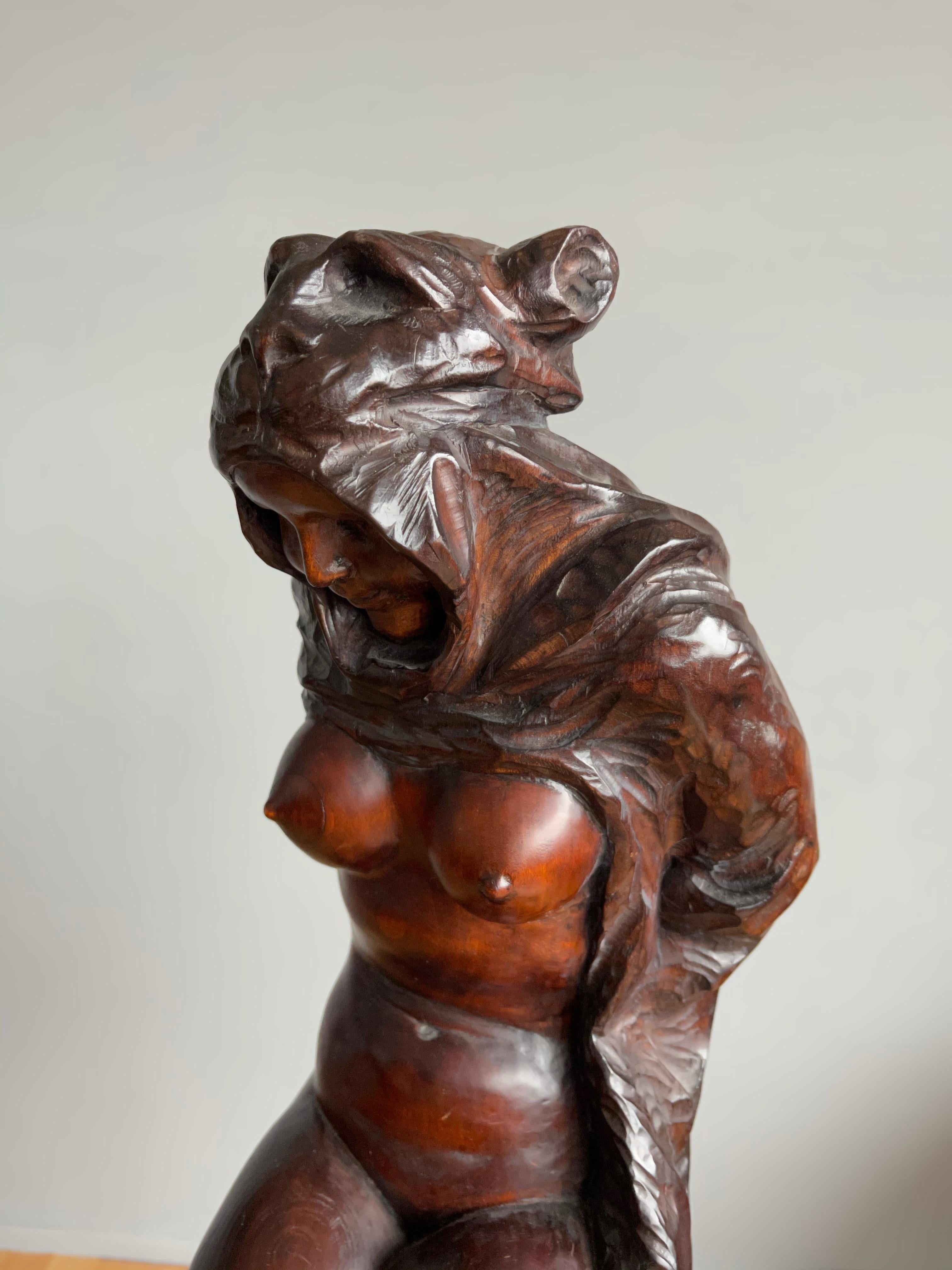 wooden female sculpture