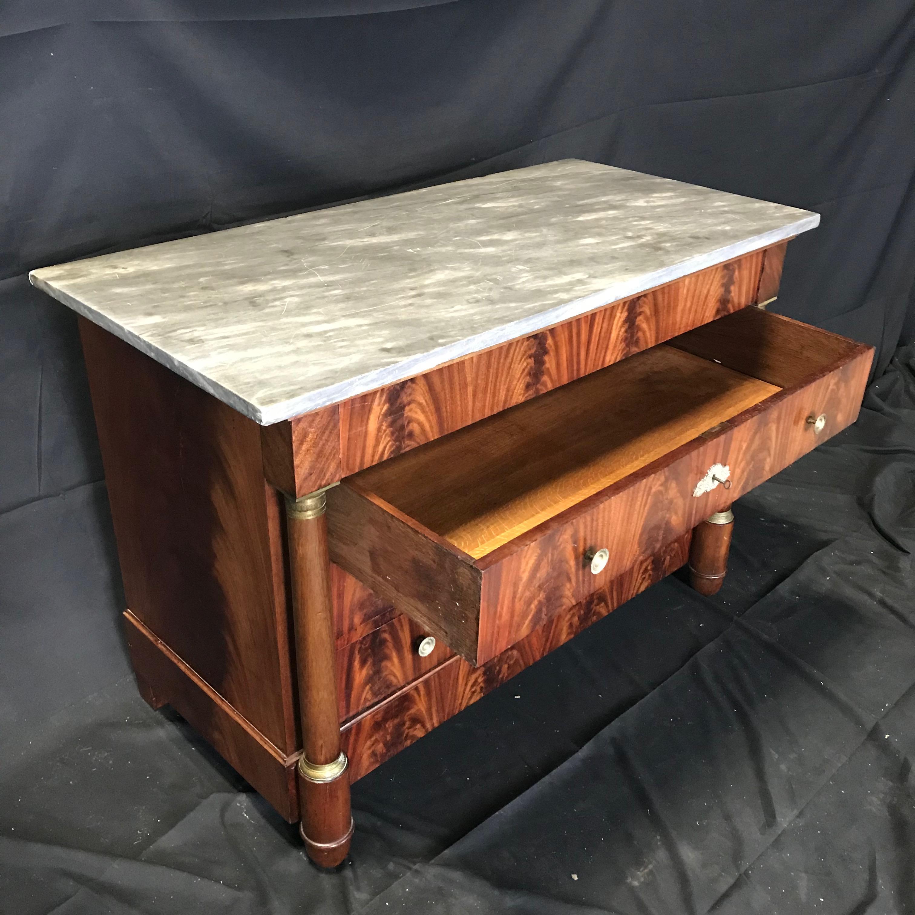 Impressive Antique Flame Mahogany French Empire Commode with Marble Top In Good Condition In Hopewell, NJ