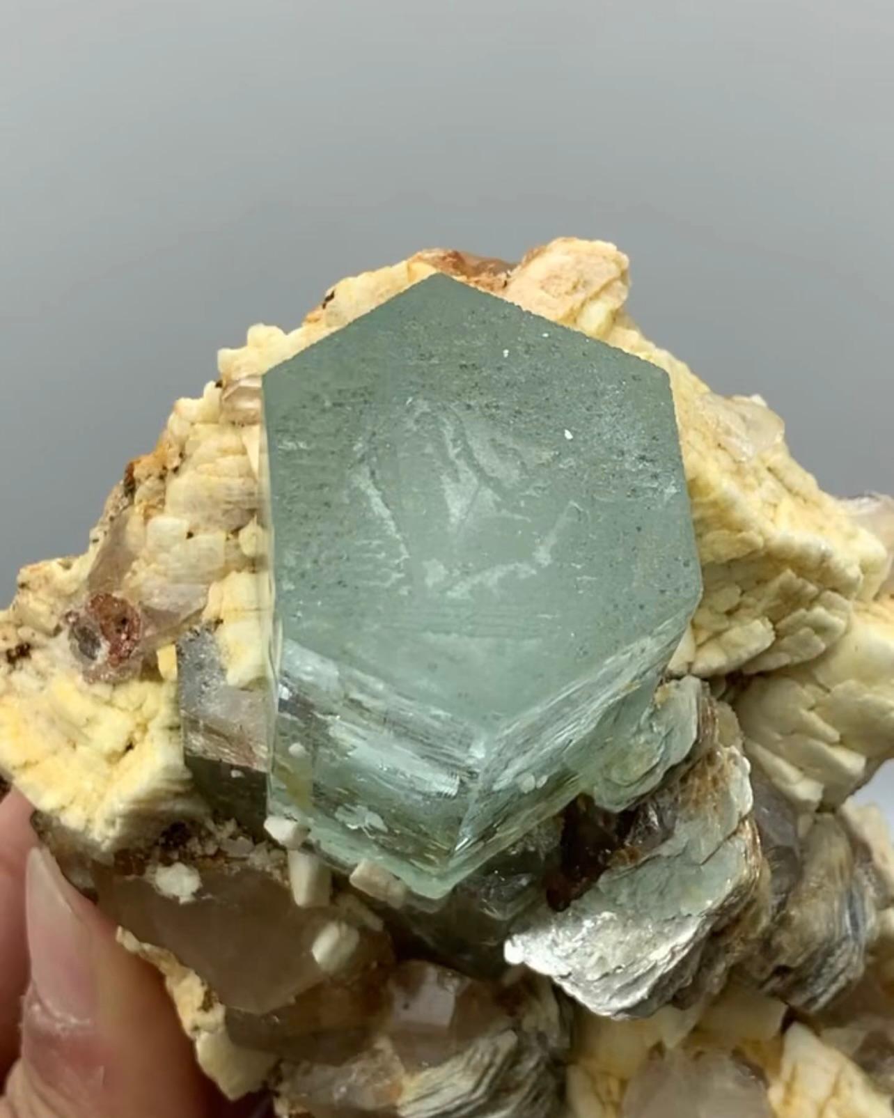 Product Information:

Specimen Name: Aquamarine Crystal on Albite

Weight: 458 grams

Dimension: H: 9.3 x W: 9 x D: 7.8 cm 

Treatment: None

Origin: Shigar Valley, Skardu District, Gilgit Baltistan Province, Pakistan

Description:

This stunning