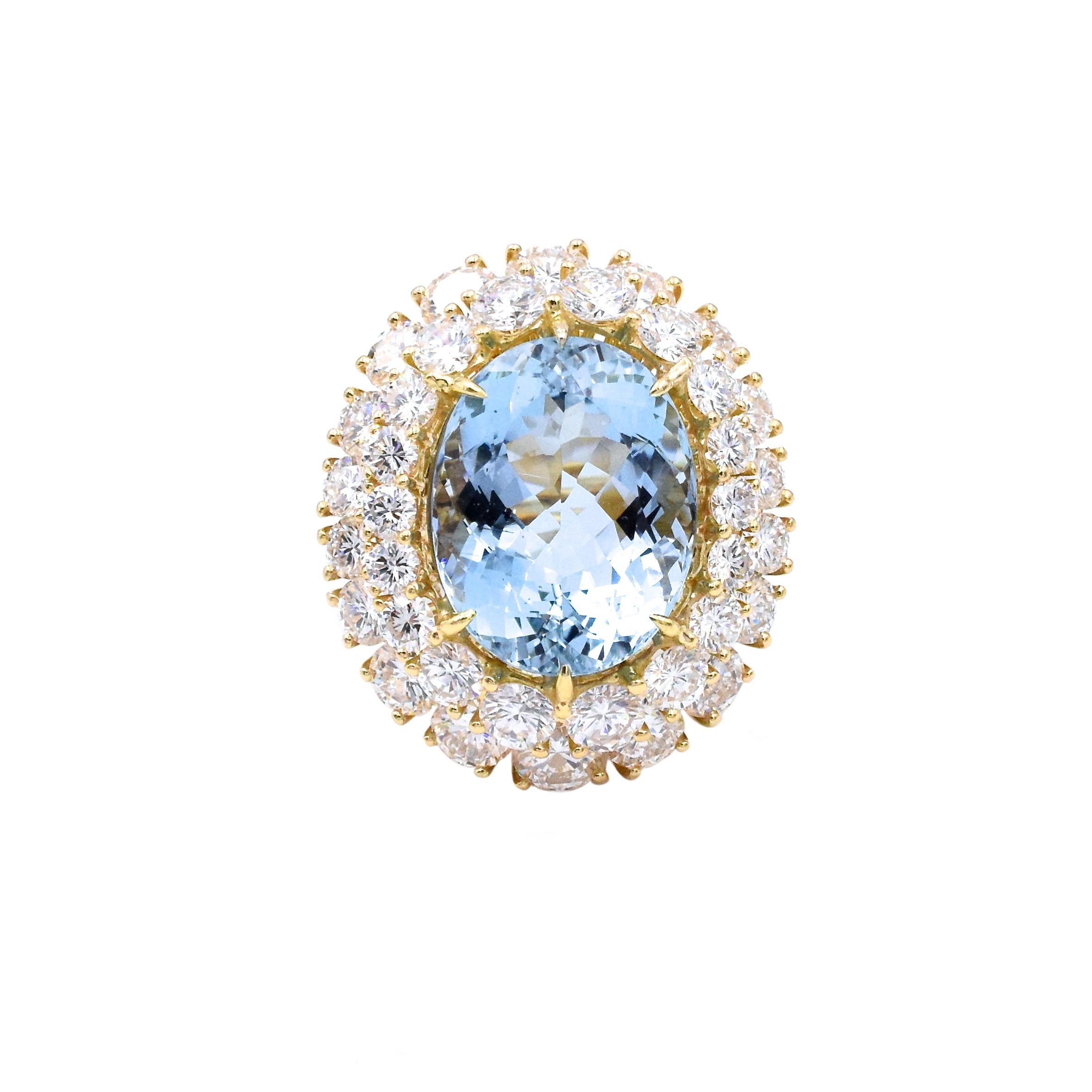 Impressive  Aquamarine & Diamond Ring!!
Makes a great statement!
Center aquamarine is 14.20 carats with double raw diamonds with estimated weight of 10 carats set in yellow gold. Color of the diamonds are E/F &clarity is VS
The ring can be 
