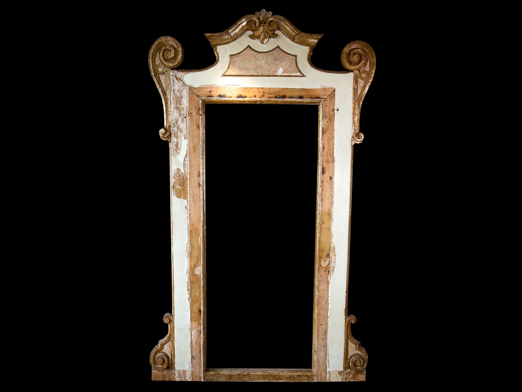 Northern Italy, early 18th century 

With feature generously proportioned gilded scrolls surmounted with an acanthus leaf crest motif. Would be stunning if re-appropriated as a full height mirror.

Dimensions: Max H 250cm x Max W 150cm x D