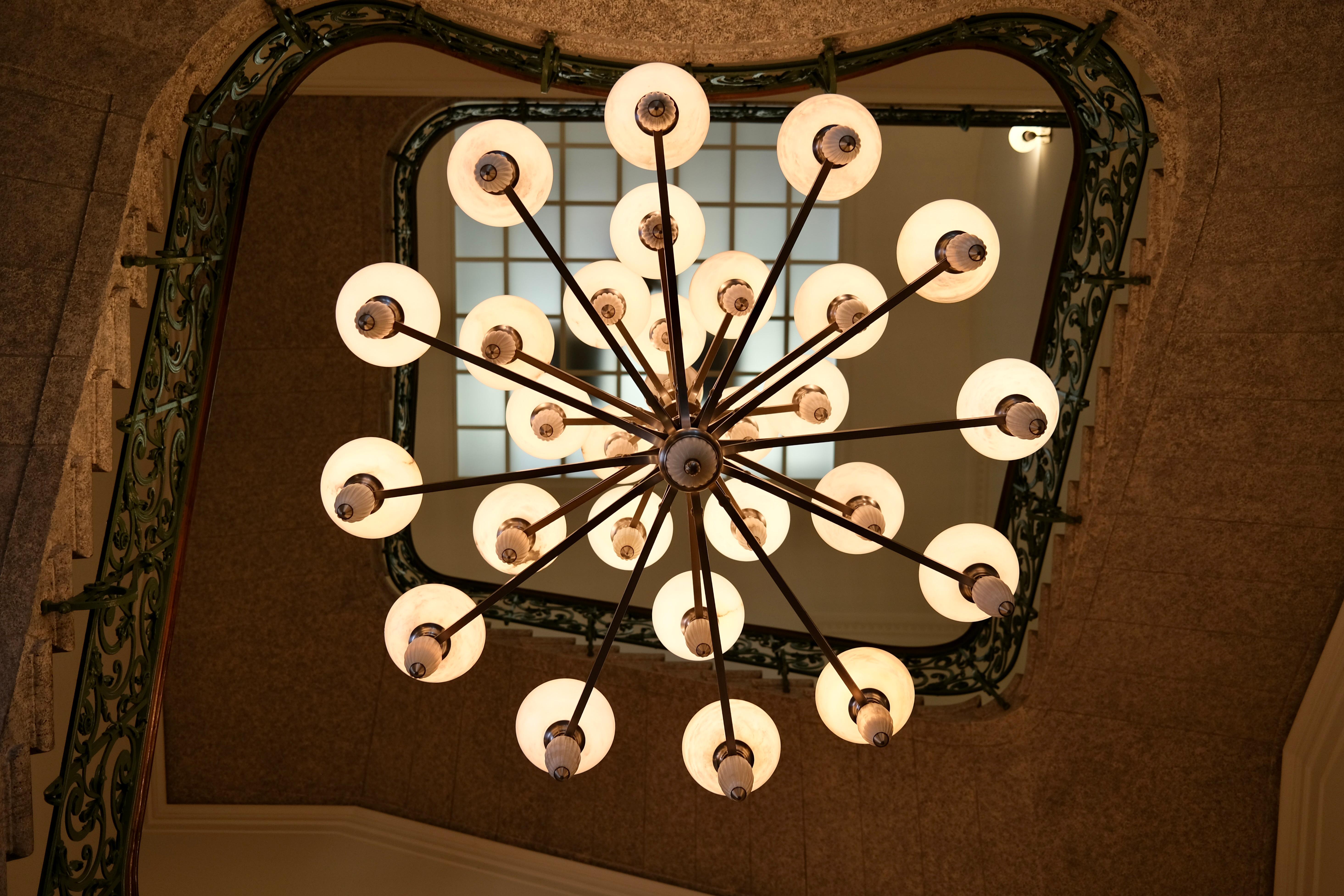 20th Century Impressive Art Deco Style Chandelier with Alabaster Bowls and Illuminated Cones For Sale