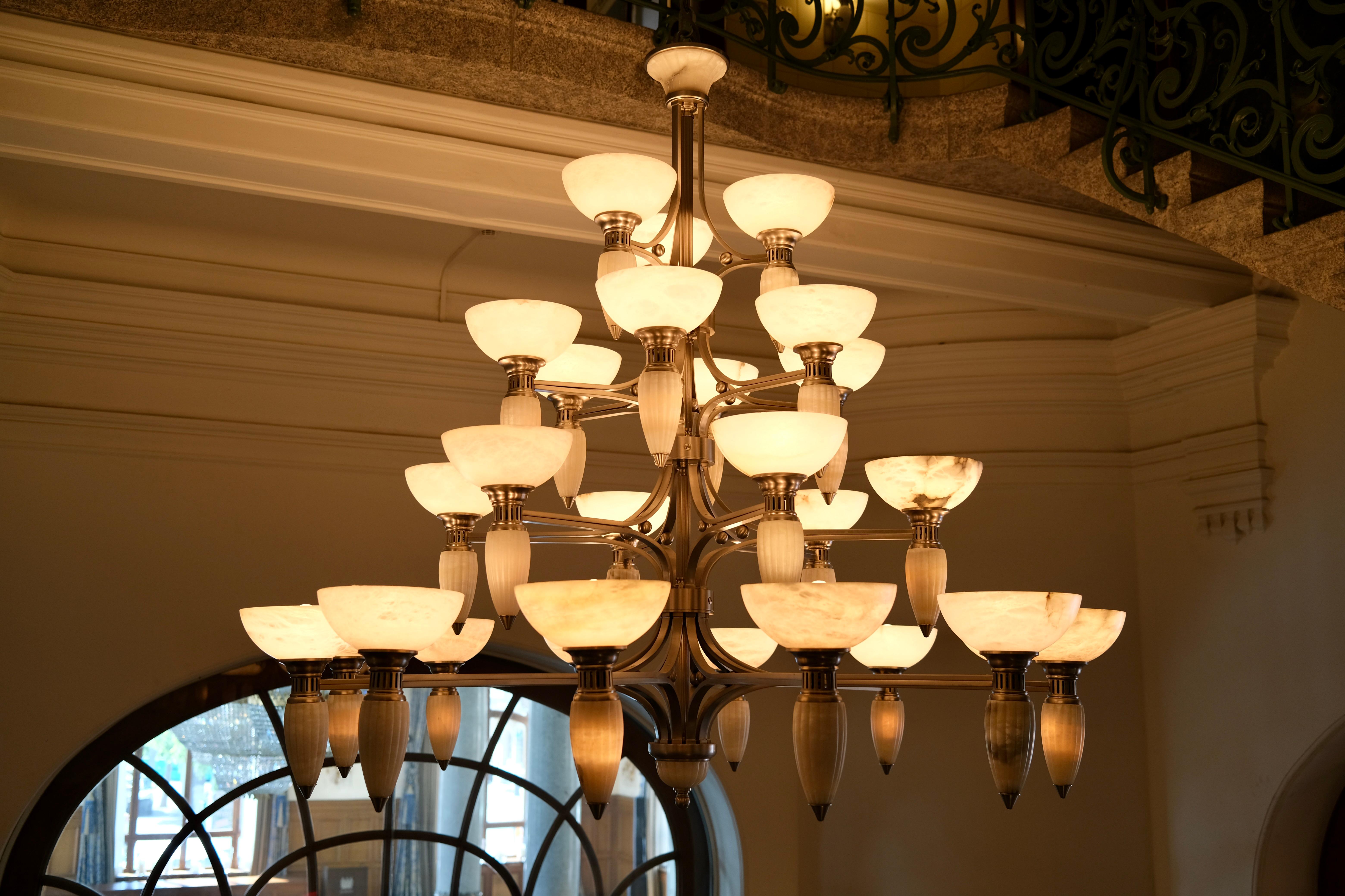 Metal Impressive Art Deco Style Chandelier with Alabaster Bowls and Illuminated Cones For Sale