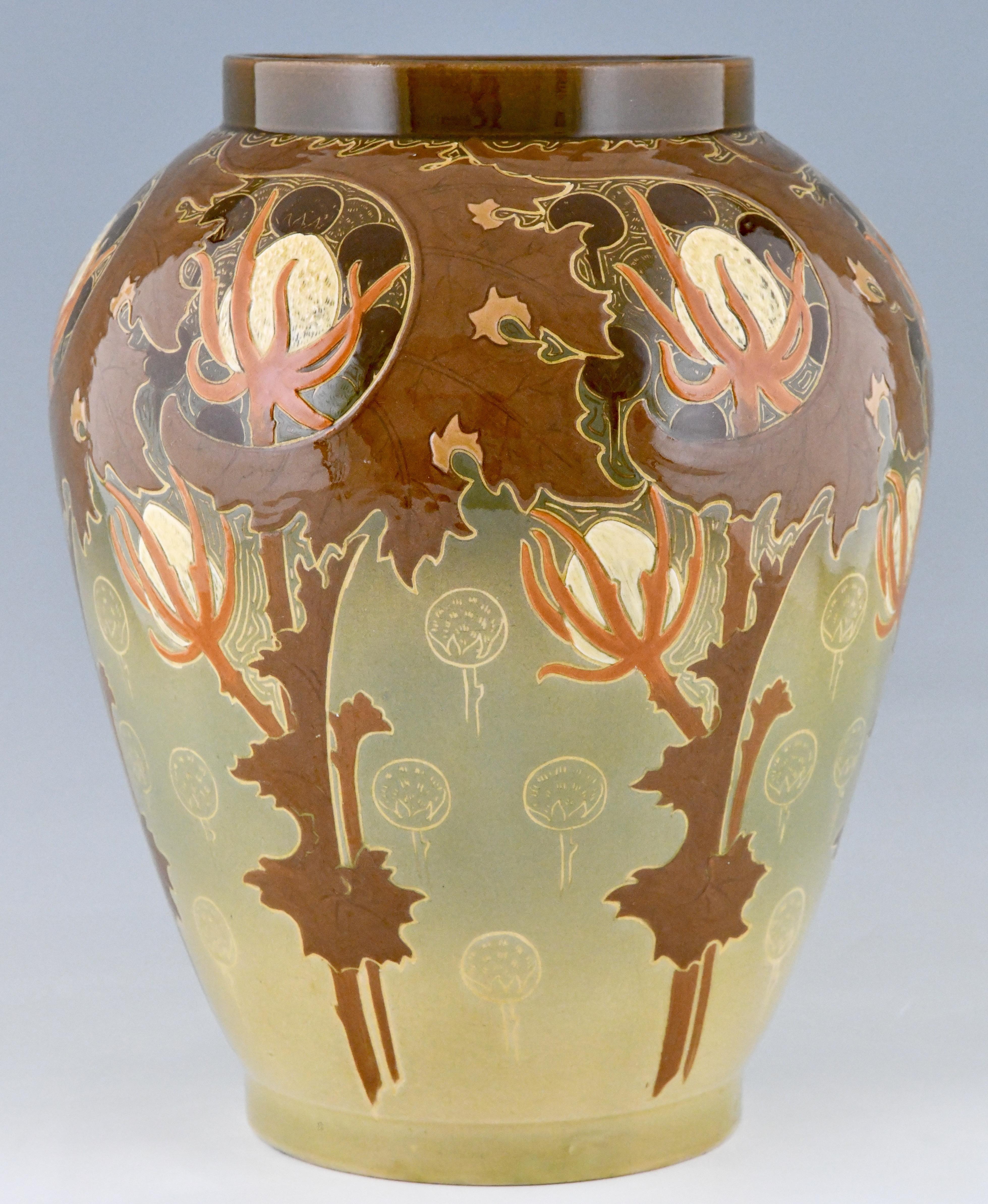 Art Nouveau ceramic vase with flowers by Hippolyte Boulenger, Choisy le Roi. France ca. 1900. Ceramic with incised & glazed decoration of flowers.