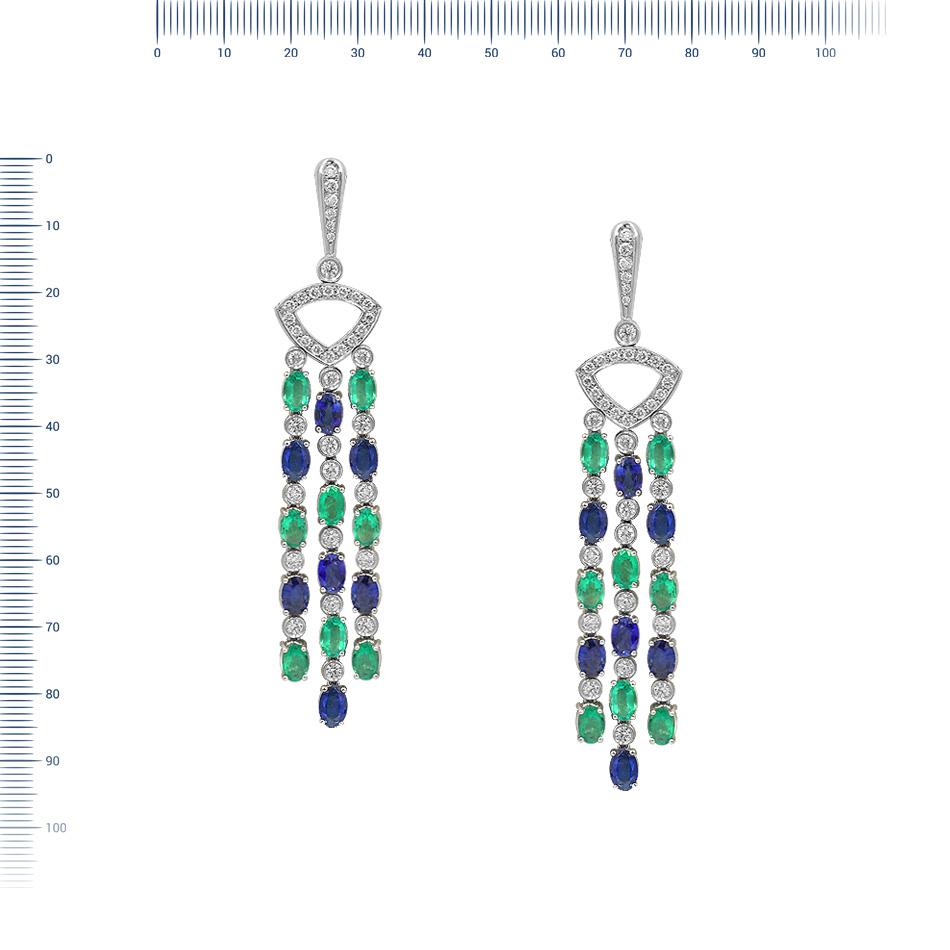 Boucles d'oreilles  Or 18 K
Diamant 34-Rond 57-1,73-4/6A 
Diamant 42-Rond 57-0,8-4/5A 
Diamant 2-Rond 57-0,01-4/5A 
Saphir bleu 14-Oval-8,4 Т(4)/3A 
Émeraude 16
Poids 29,67

Forte de l'héritage des anciennes traditions de la haute joaillerie suisse,