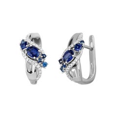 Impressive Blue Sapphire Diamond White Gold Ring