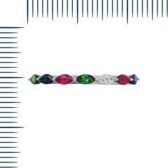 Beeindruckender Ring aus Weißgold mit blauem Saphir, Rubin, Tsavorit und Diamant