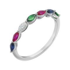 Impressionnante bague en or blanc avec saphir bleu, rubis, tsavorite et diamants