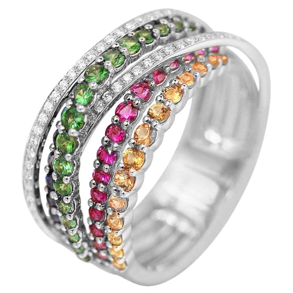 Impressionnante bague en or blanc avec saphir bleu, rubis, tsavorite et diamants