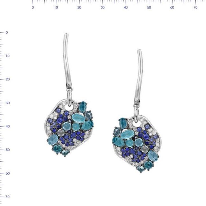 Earrings White 14K Gold (Matching Ring Available)

Diamond 46-RND-0,37-5/5
Blue Sapphire 36-RND-0,76 Т(4)/3
Blue Sapphire 10-Oval-0,2 Т(4)/3
Topaz 6-RND-1,08 (5)/2
Topaz 14-RND-1,78 4 (3)/1A
Weight 7.74

It is our honour to create fine jewelry, and