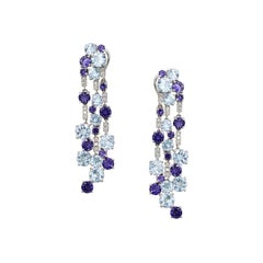 Impressionnantes boucles d'oreilles en goutte en or 18 carats avec topaze bleue et diamants en cordon de verre