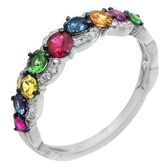 Impressionnante bague en or blanc avec saphir bleu, jaune, orange, rubis, tsavorite et diamant