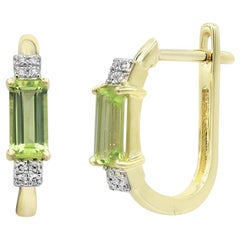 Impressionnantes boucles d'oreilles à levier en or jaune avec chrysolite et diamants