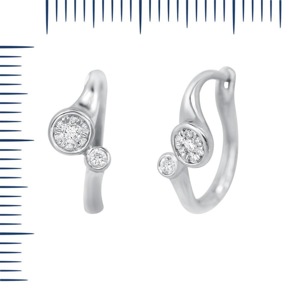 Earrings White Gold 14 K (Matching Ring Available)

Diamond 14-RND-0,09-G/VS2A
Diamond 2-RND-0,07-G/VS1A

Weight 2.62 grams

With a heritage of ancient fine Swiss jewelry traditions, NATKINA is a Geneva based jewellery brand, which creates modern