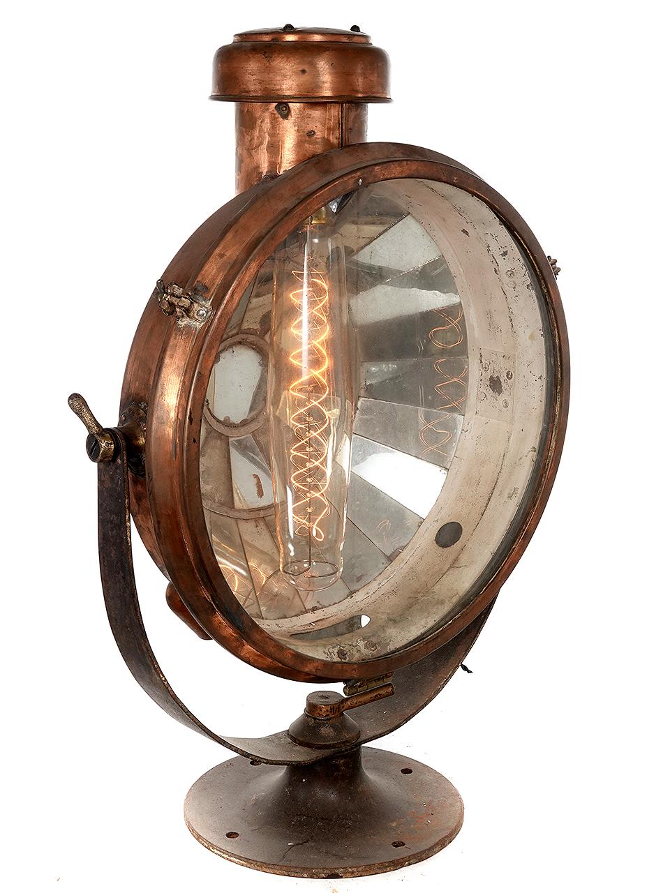 This is a very showy lamp. Even if It was never meant to light something it works as an interesting object. I like it so much we have it on 24 hours in our showroom window. The casing is all copper with brass fittings. Inside there are 32 mirrors in