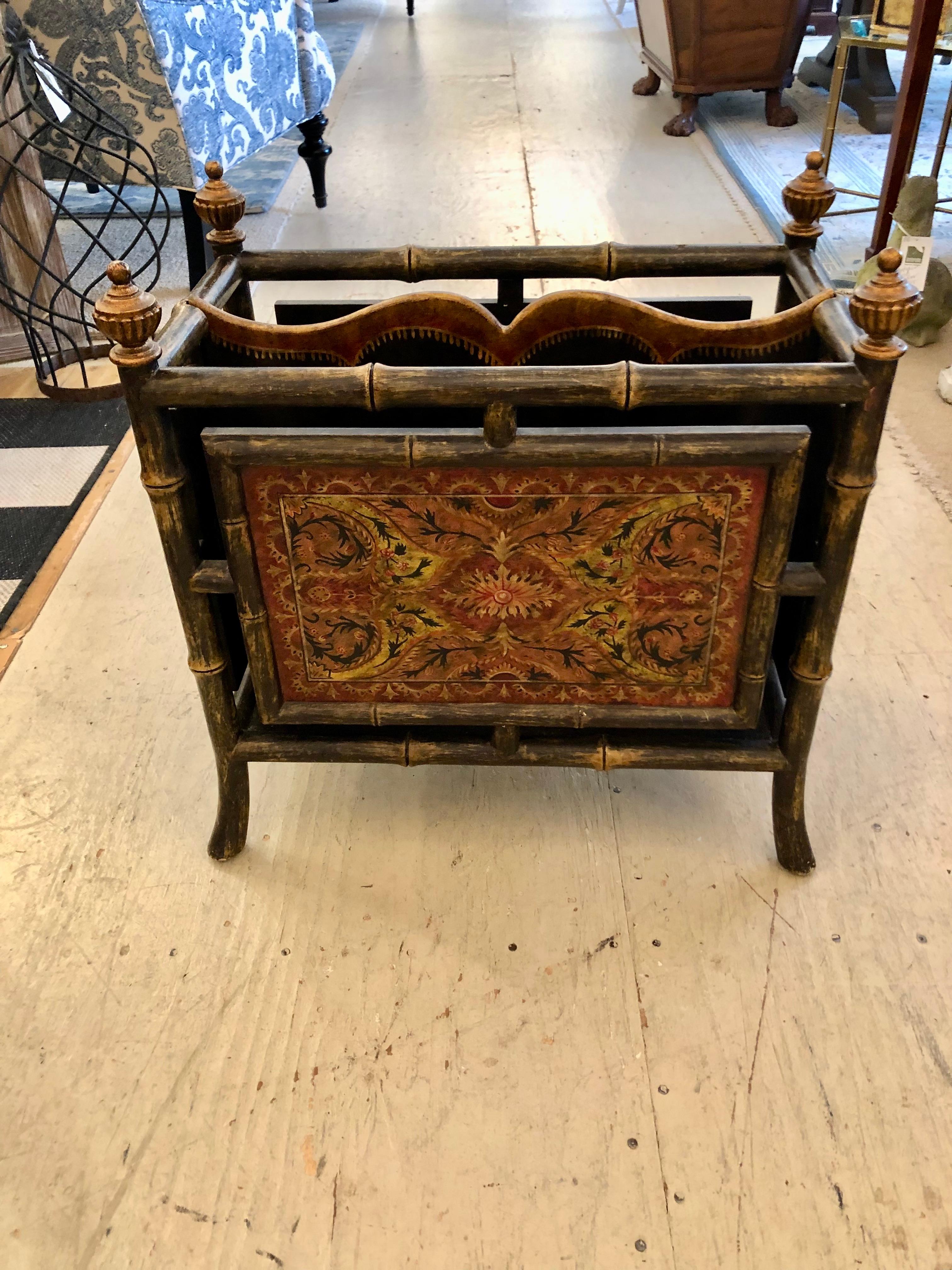 Impressive decorative designer magazine rack having antiqued faux bamboo structure and gorgeous intricately painted panels as well as carved gilded finials.
(Chris).