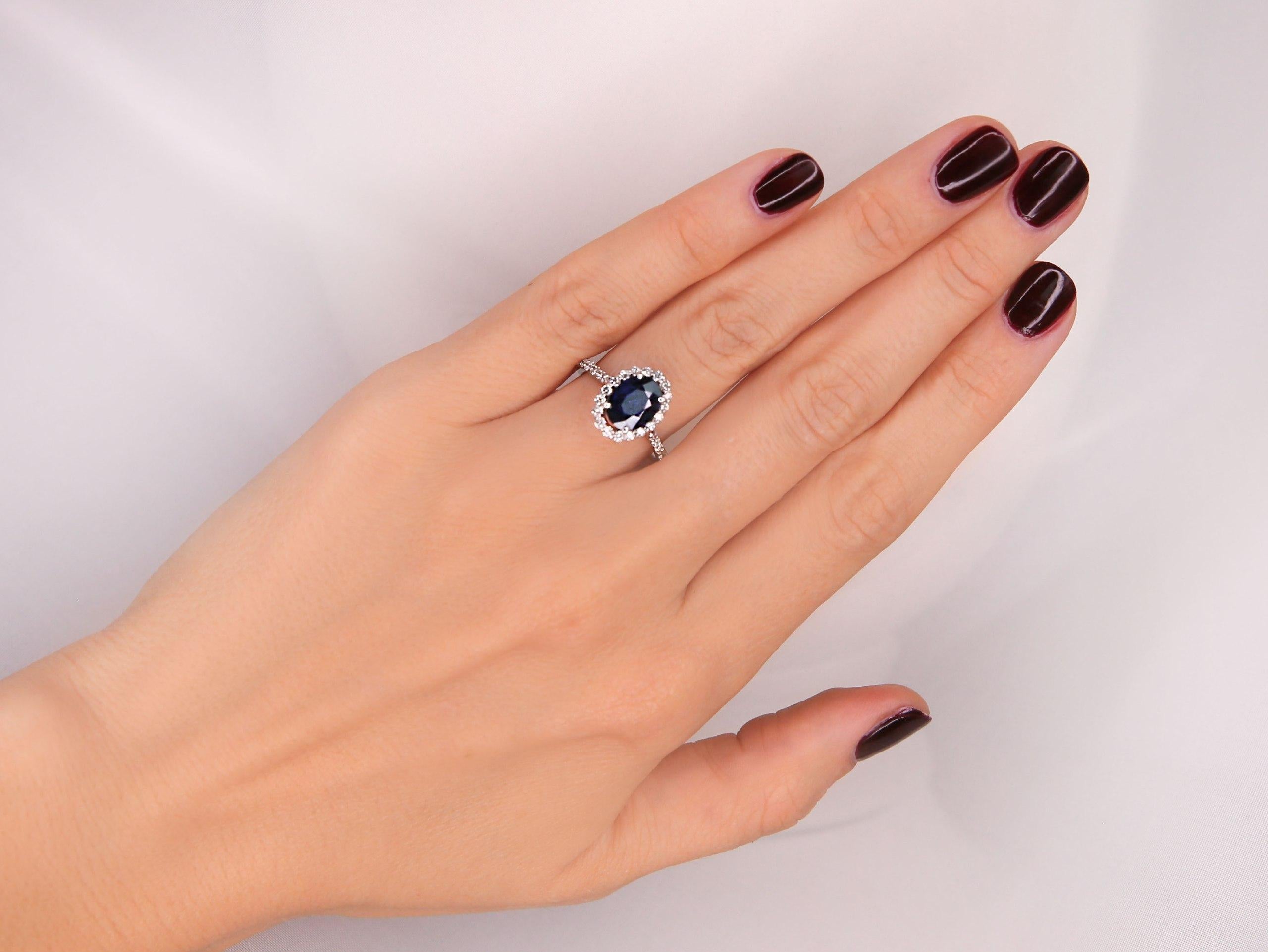 18K Solid White Gold Diamond Ring

Blue Natural Sapphire 3.27 Ct 
Stone Dimensions: 9.68x8.00 mm 

Treatment Method: Heat.

Natural Diamond 
Color: F-G 
Clarity: VS2-SI1  1.00 Ct 

Shape: Round 
Not-treated 

Total Metal Weight: 3 Grams


With a