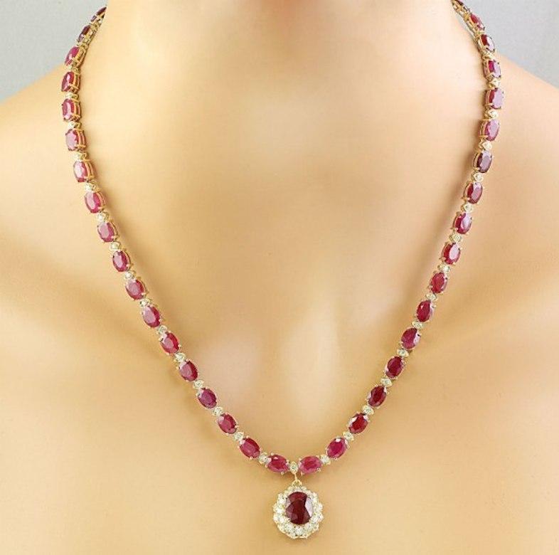 44.60 CTW Ruby 18K Yellow Gold Diamond necklace

Total Necklace Weight: 28.7 Grams
Necklace Length: 74.8cm (18.5 Inches)
Center Ruby Weight: 3.50 Carat (10.00x8.00 Millimeters)
Side Ruby Weight: 38.90 (7.00x5.00 Millimeters)
Diamond Weight: 2.20