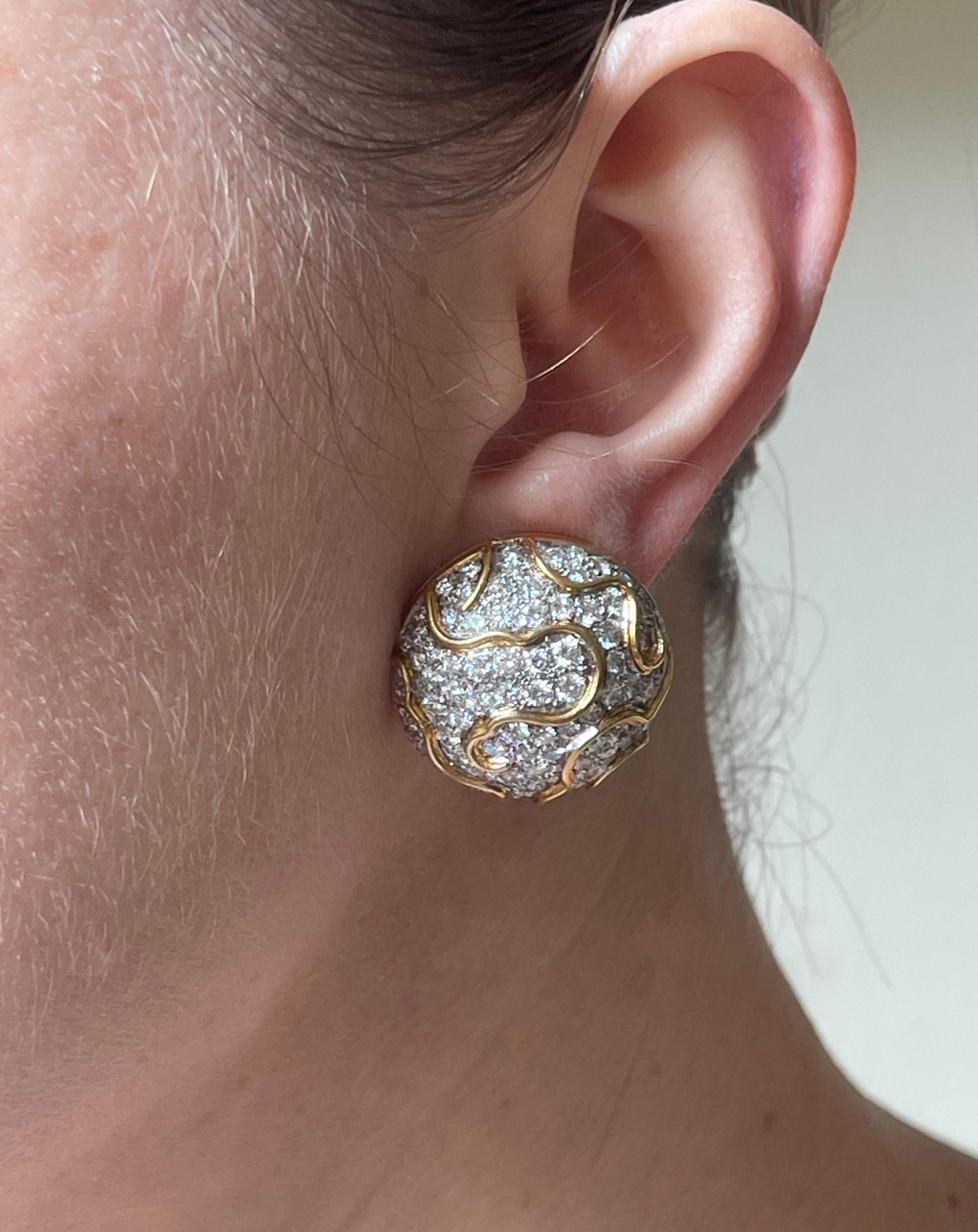Pair of 18k gold button earrings with approx. 8ctw in GH/VS diamonds. Earrings are 1