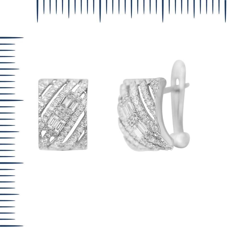Earrings White Gold 14 K (Matching Ring Available)

Diamond 110-RND-0,47-G/VS1A
Diamond 8-RND-0,23-G/VS1A

Weight 3.56 grams

With a heritage of ancient fine Swiss jewelry traditions, NATKINA is a Geneva based jewellery brand, which creates modern
