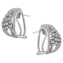 Impressionnantes boucles d'oreilles à levier en or blanc et diamants